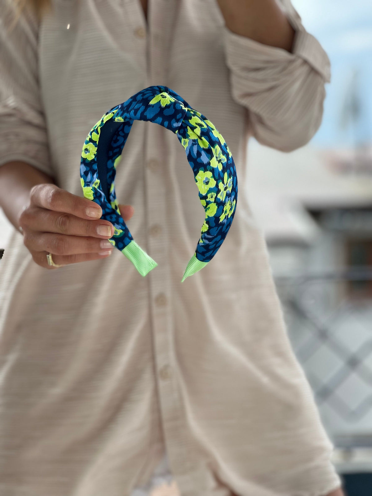 A Colorful Headband that's sure to turn heads with its fun and playful design.