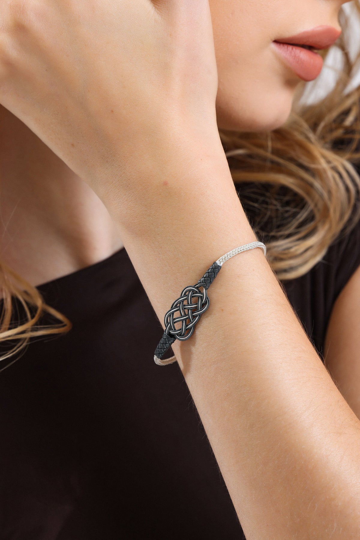 Intricate Silver Braided Knot Bracelet