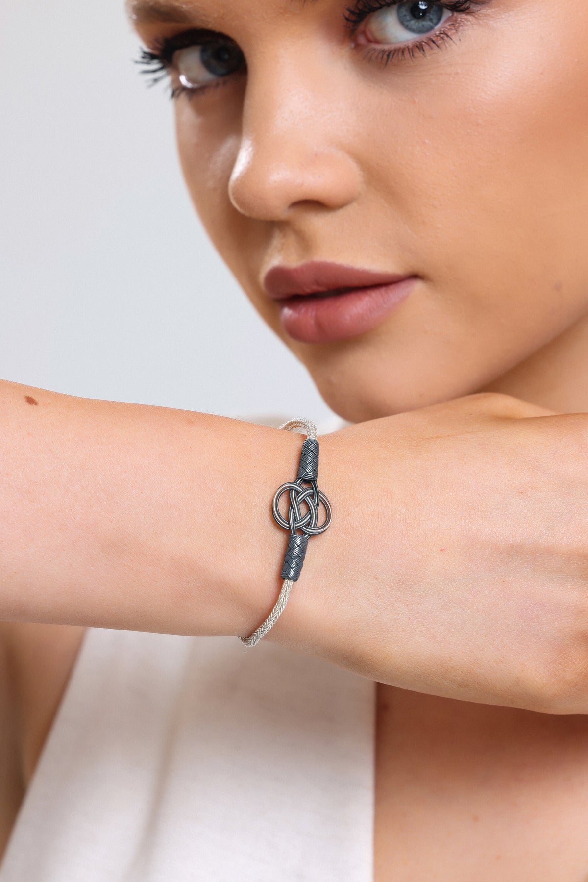 Sterling Silver and Black Braided Bracelet - Elegant Knot Design