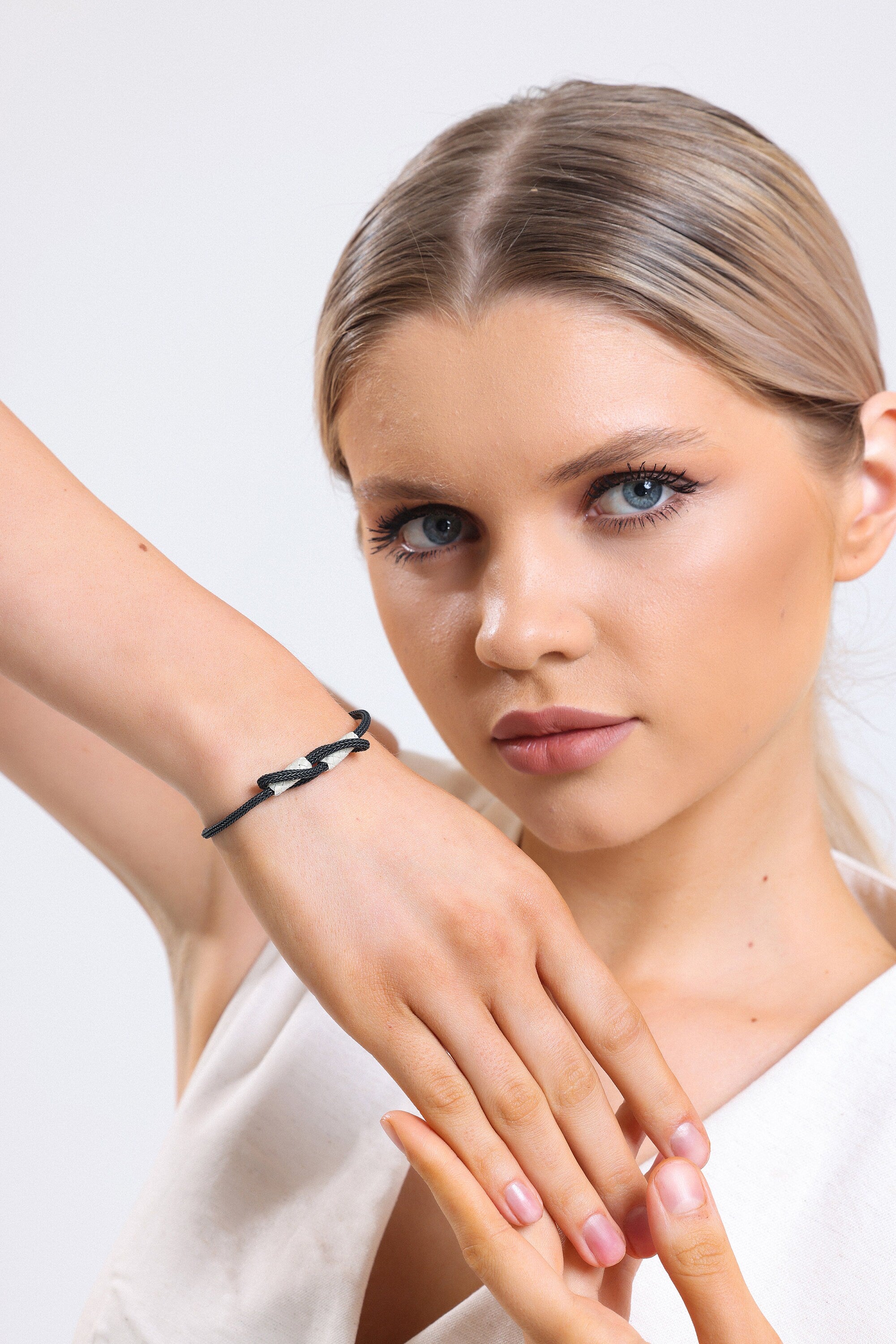 Sleek Black Braided Bracelet with Sterling Silver Accents - Handcrafted Knot Design