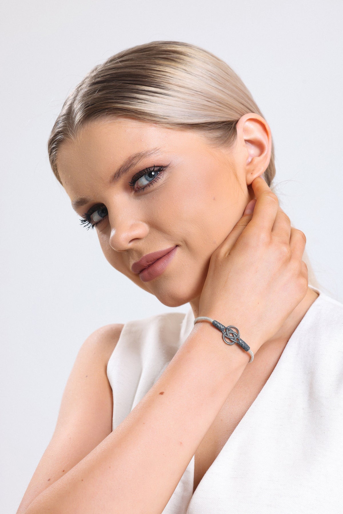 Sterling Silver and Black Braided Bracelet - Elegant Knot Design