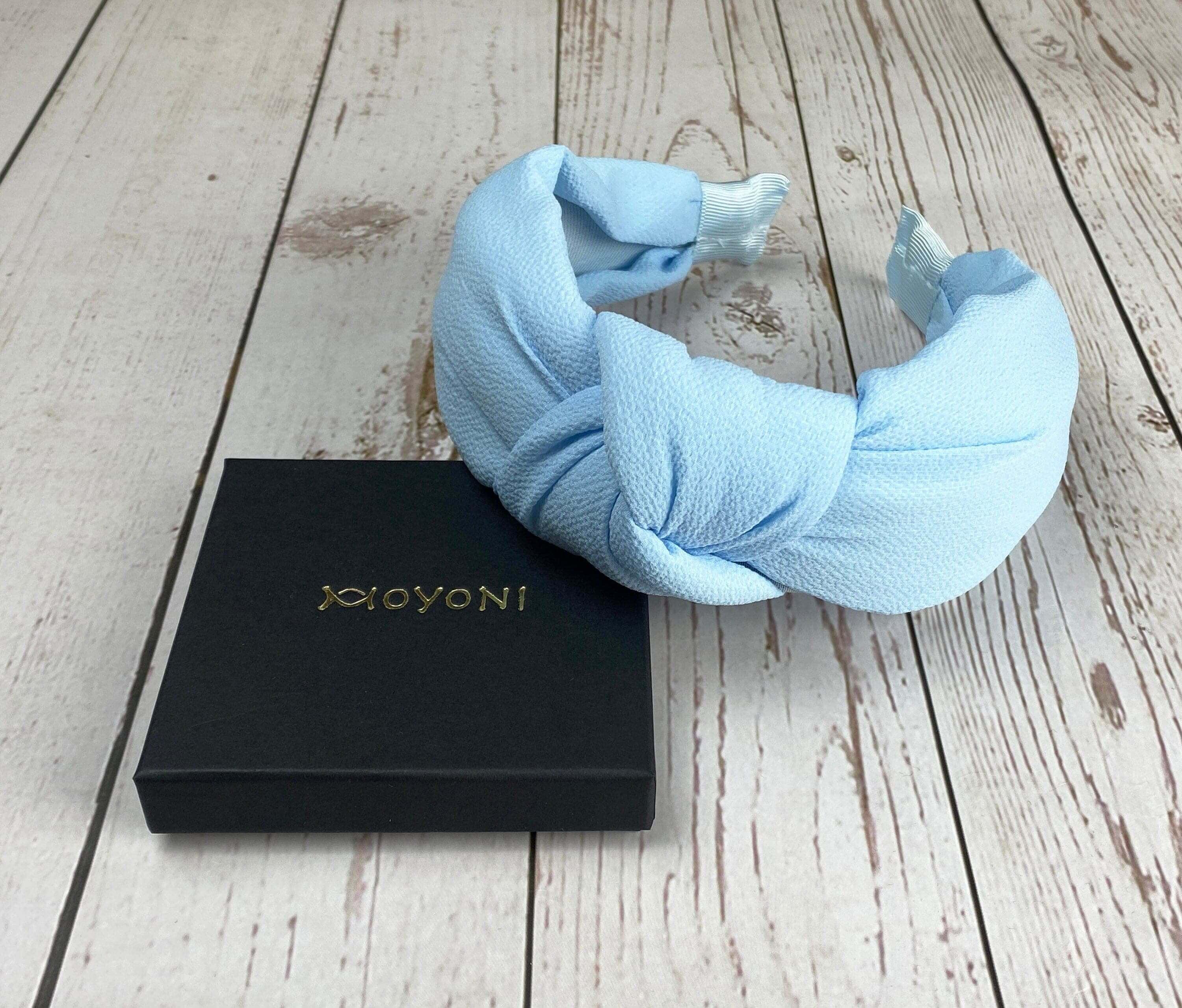Unique Baby Blue Twist Knot Headband - Fashionable Women's Hairband with Viscose Crepe Padding available at Moyoni Design