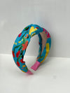Unique Colorful Knotted Headband with Flower Pattern - Stylish Women's Hairband in Blue, Orange, Pink, and Green available at Moyoni Design