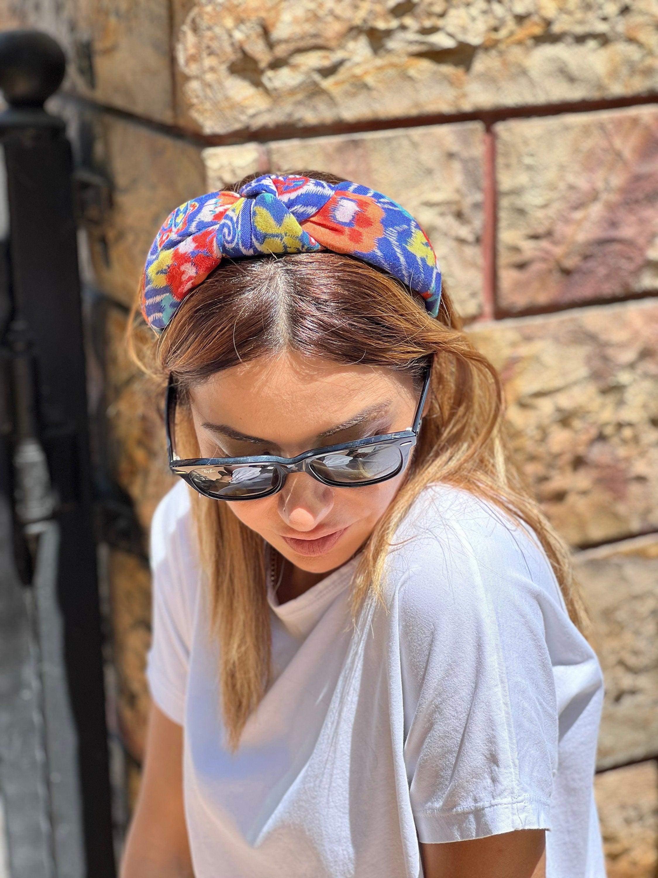 Beautiful Ethnic Pattern Knotted Headband in Blue, Pink, and Yellow - Wide and Stylish Women's Hairband with Cotton Padding available at Moyoni Design