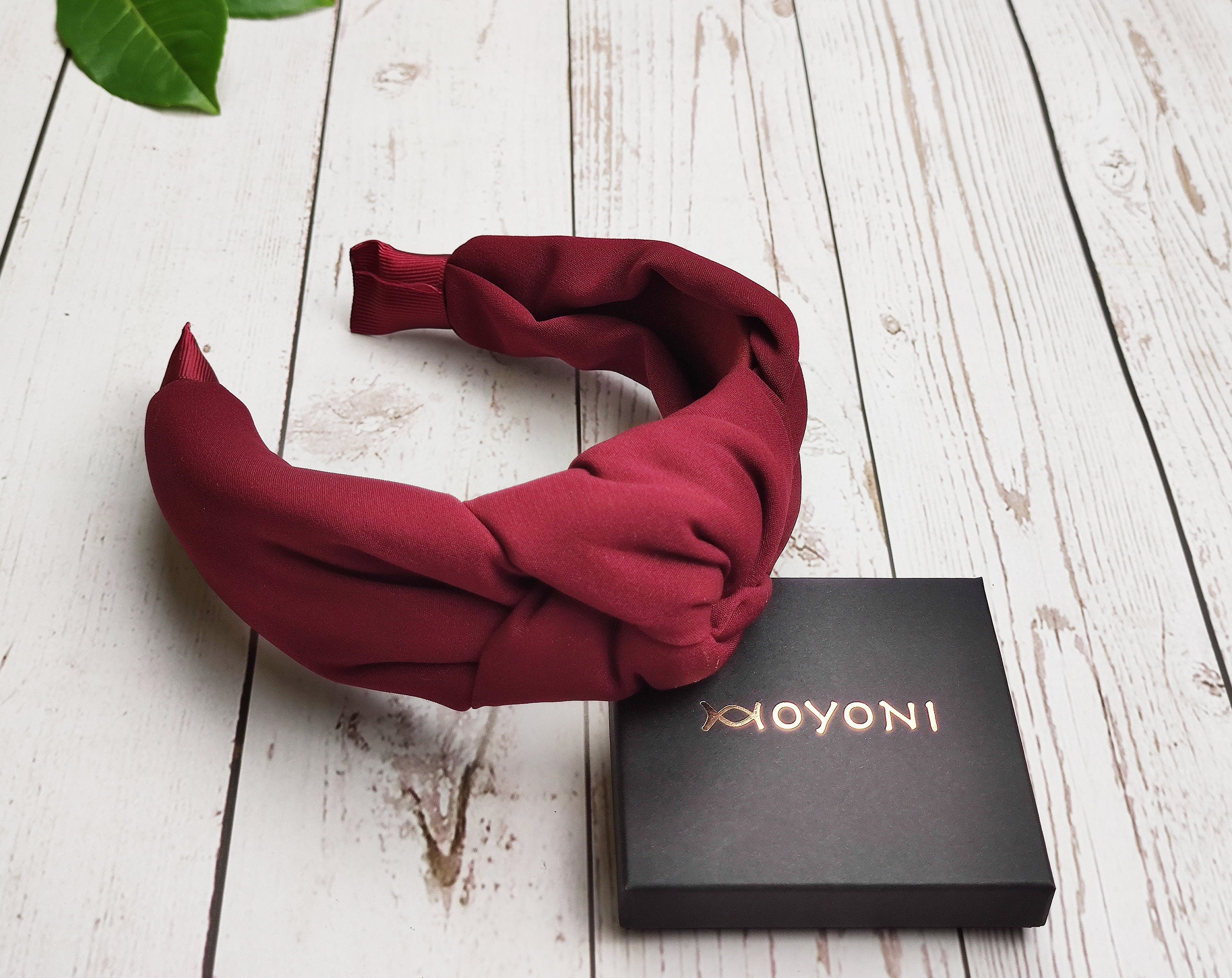 Have a fashionable and stylish day with these beautiful and trendy dark red twist knot headbands for women. Made from high-quality wine color viscose crepe, these headbands are sure to add a touch of class to your looks.