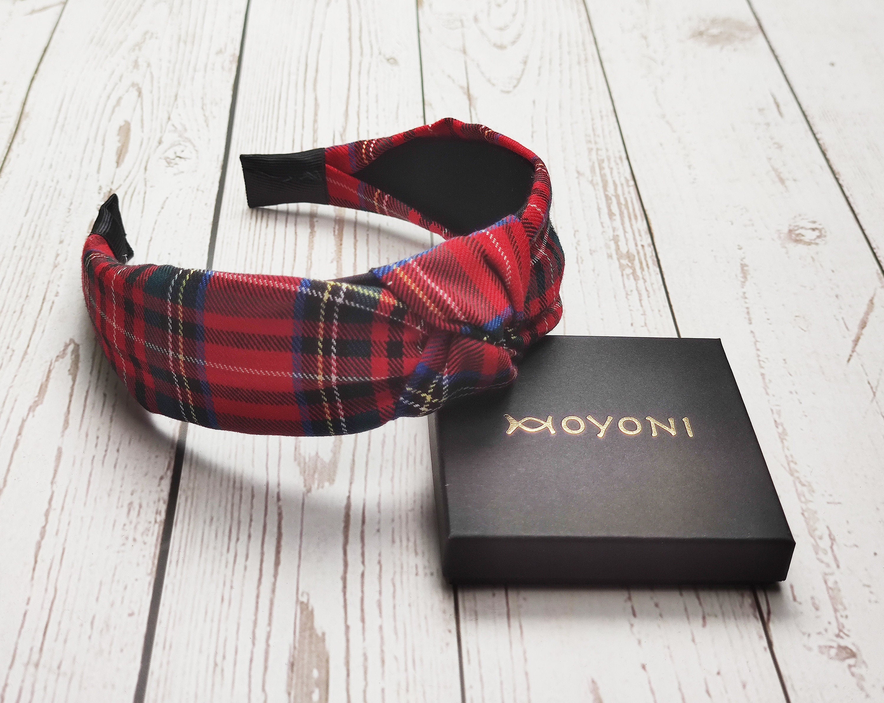 Looking for a fashionable and trendy headband to rock this autumn and winter? Check out our selection of red plaid pattern headbands for women. They will add a touch of style to your outfit and keep your hair healthy and sleek.