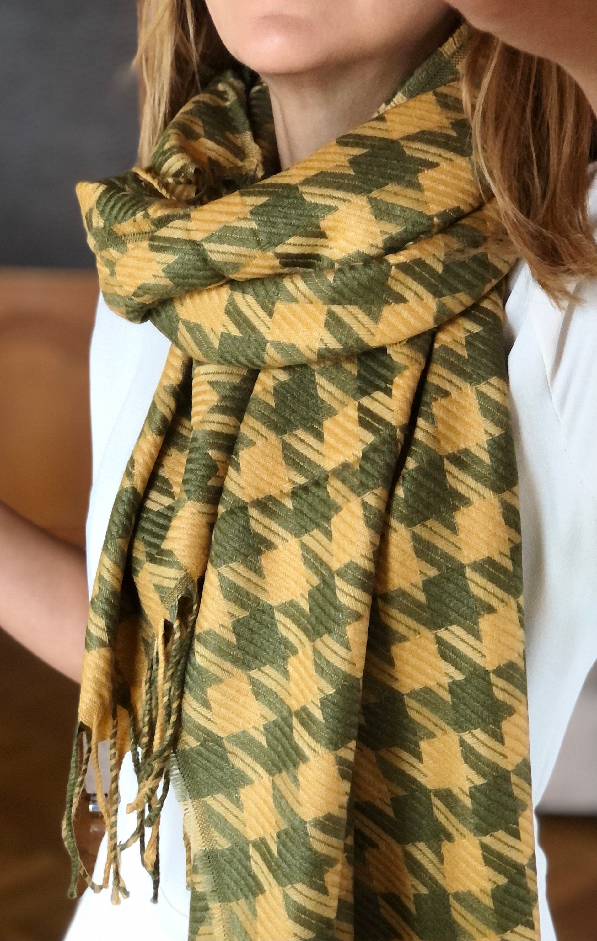 Add a pop of color to your outfit with this bright yellow khaki green shawl.