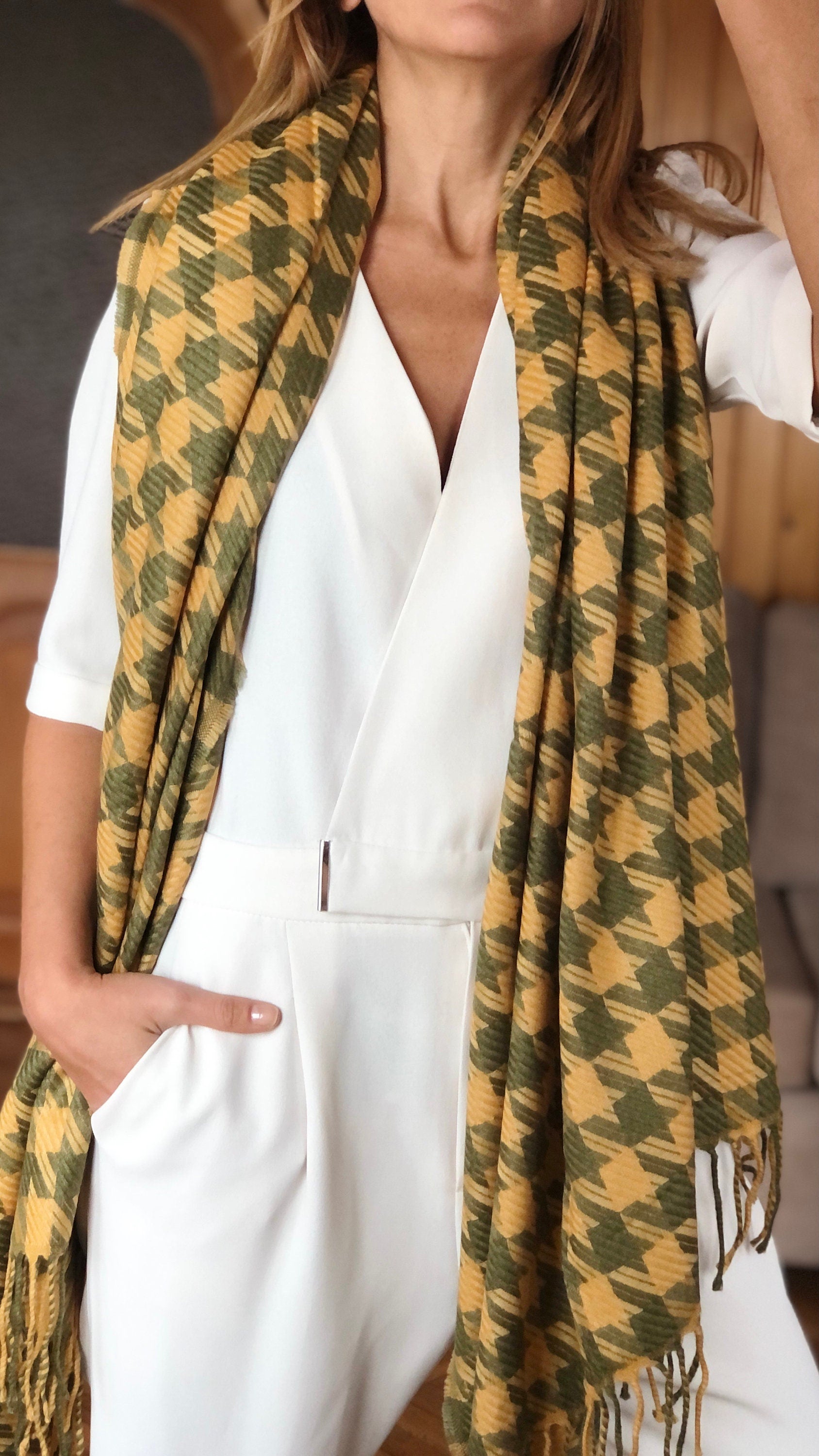 Stay cozy and chic with this soft and warm shawl, perfect for any season.