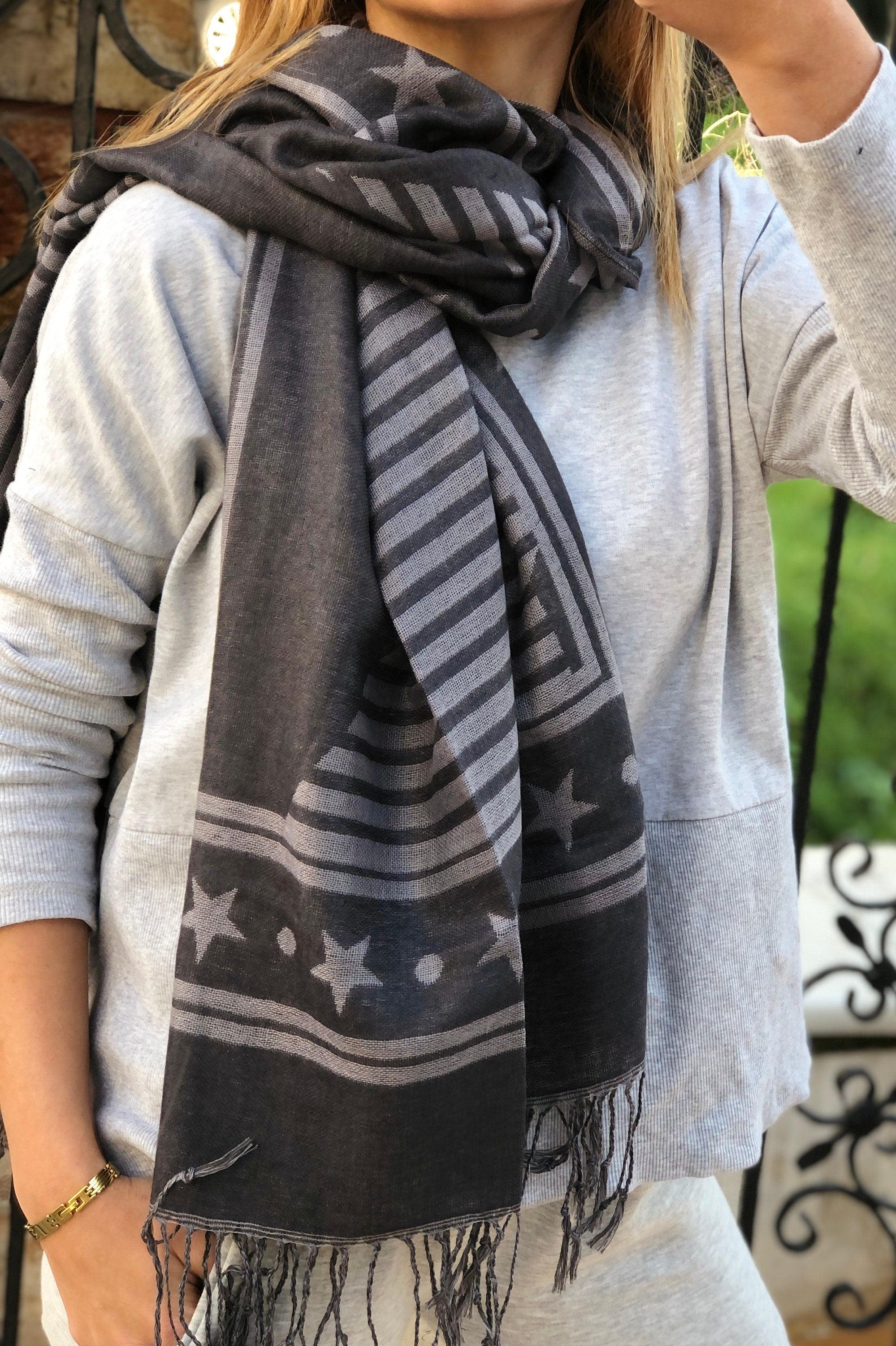 Stay stylish and warm this spring and autumn with this beautiful Rectangle Scarf featuring a unique geometric and star pattern.