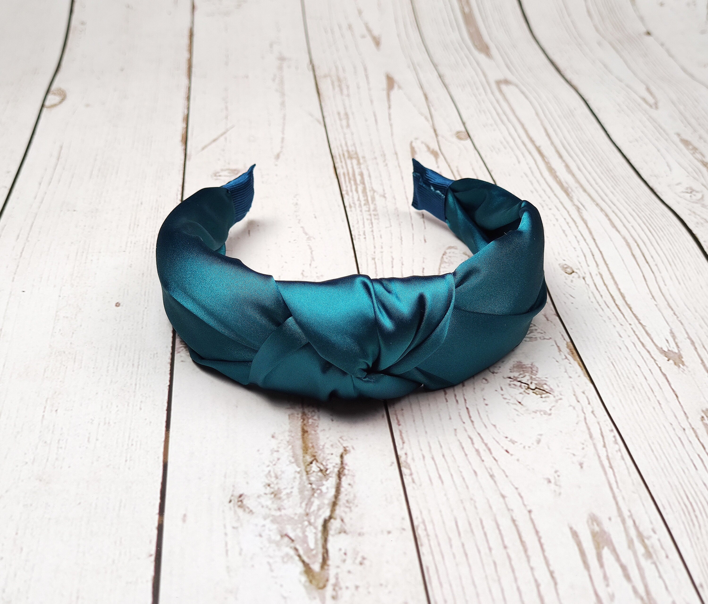 Looking for a fashionable way to keep your hair secure during the day? Then check out Patrol Blue Padded Satin Headband. It is made from soft and durable satin fabric and has a comfortable fit that will keep your hair secure all day long.
