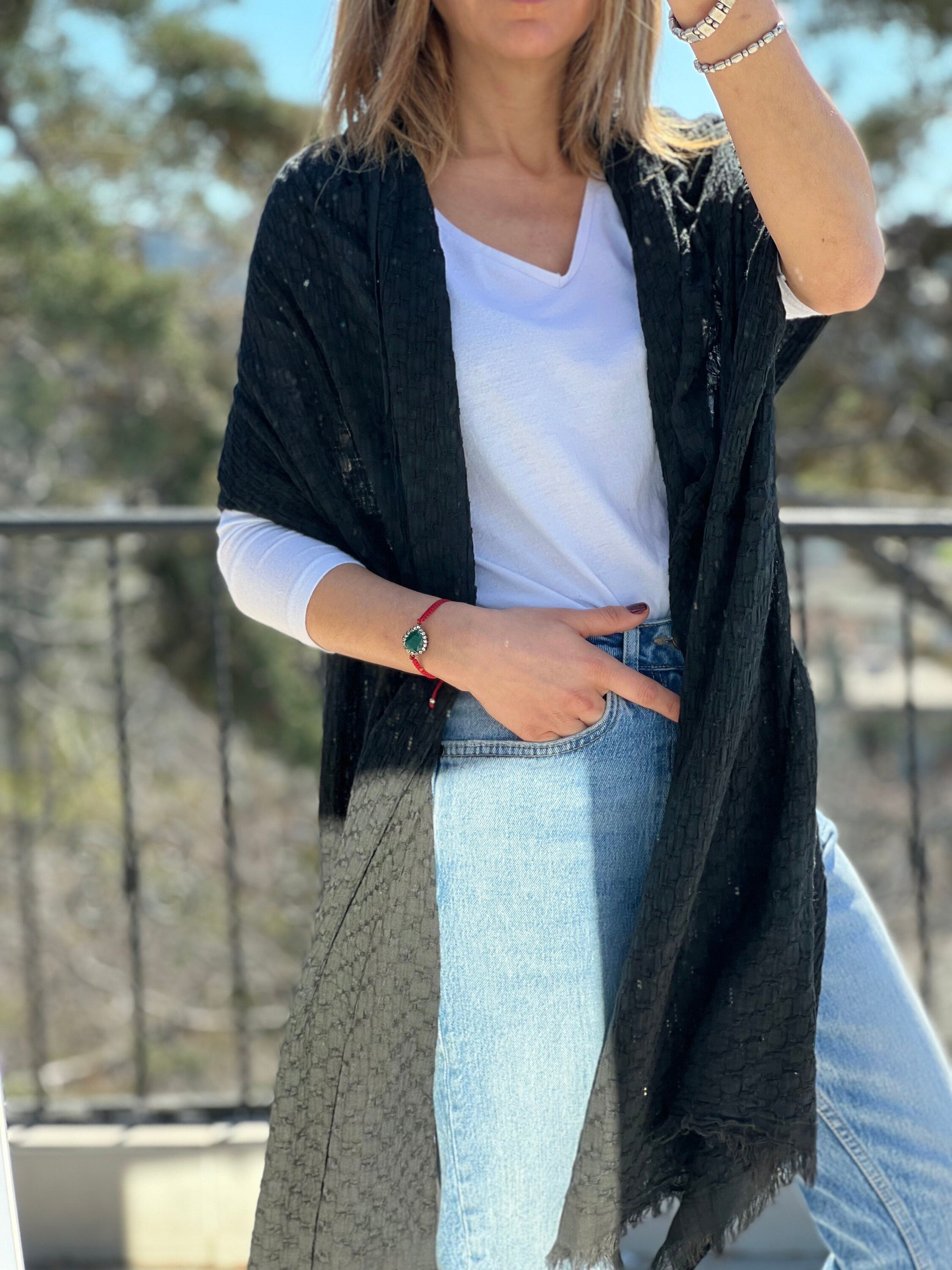 Keep your loved ones warm and cozy this winter with a large square cotton scarf in a soft gray color. This scarf is made from 100% organic cotton and is sure to make your mom feel special. It is also the perfect gift for women of all ages.