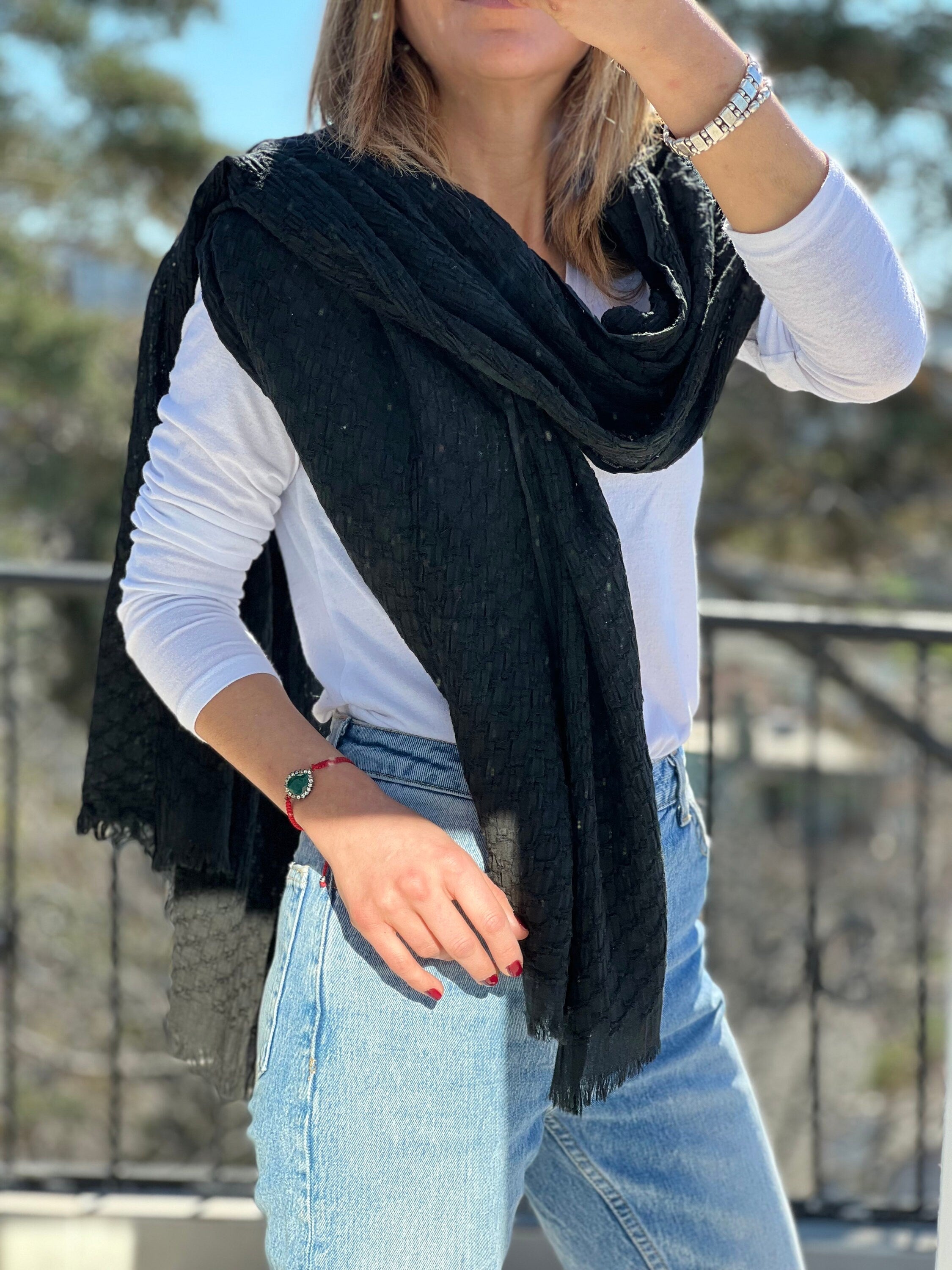 Stay comfortable and fashionable with our Black Anthracite Grey Scarf. Perfect for all seasons.