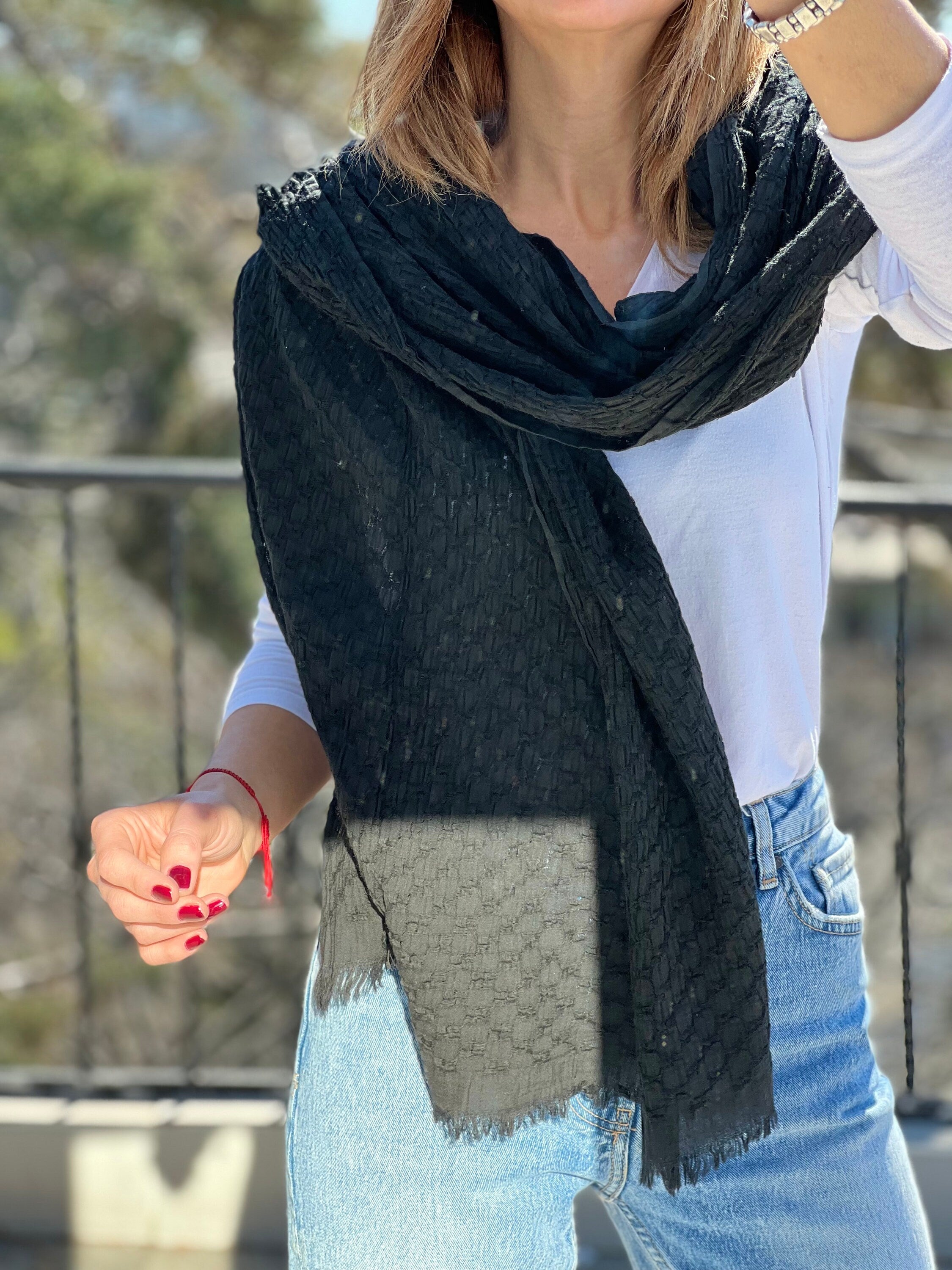 Depending on the size of your scarf, you can create different styles of scarf tops. Make sure to use a soft and smooth scarf that’ll be comfortable on your skin; a silk scarf is usually used.