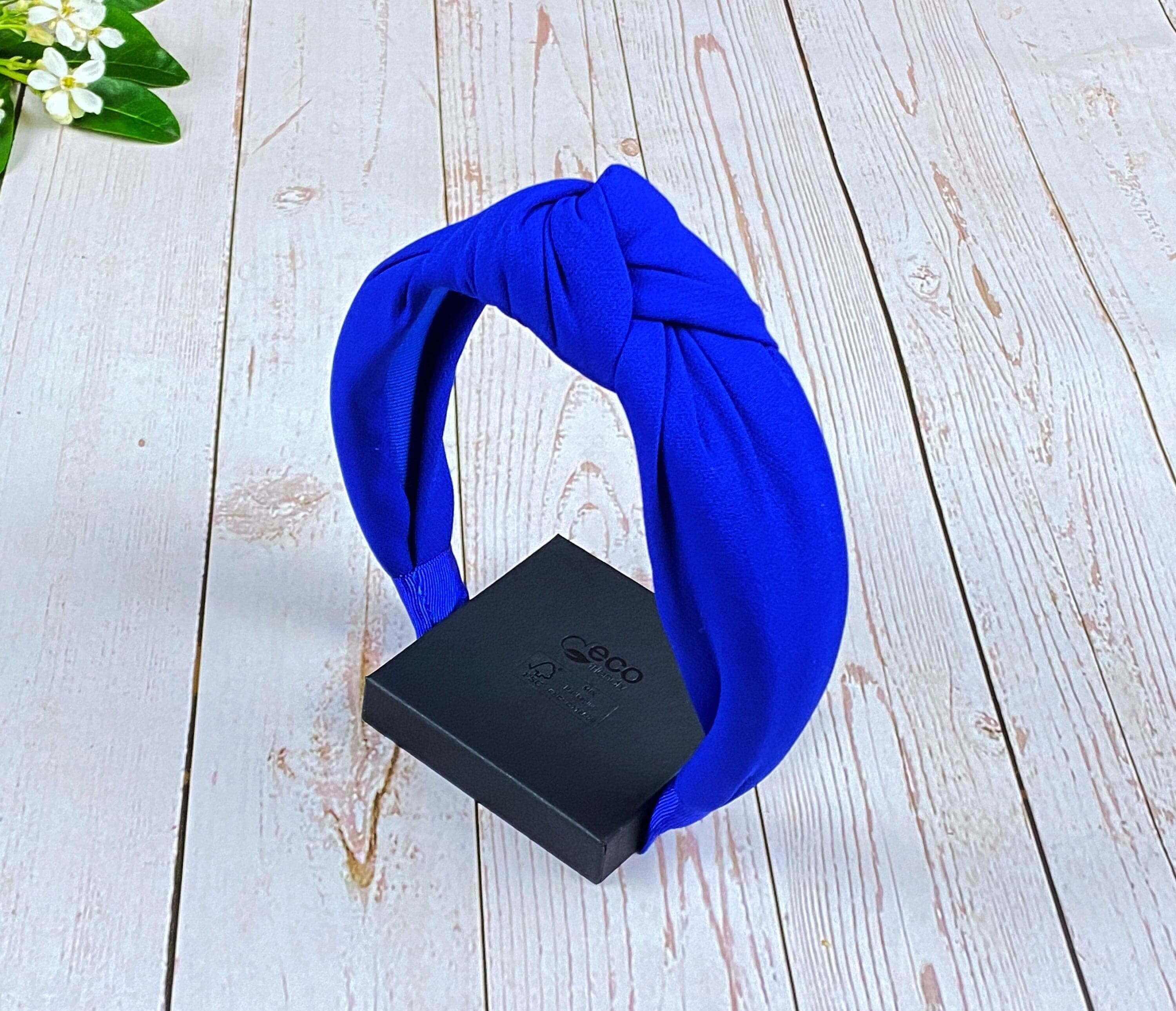 if you&#39;re in need of a handcrafted headband that will make a statement, then the Parliament Blue Band is for you. It&#39;s made from luxurious and soft 100% Viscose Crepe, ensuring that it will make a fashion statement of your own!