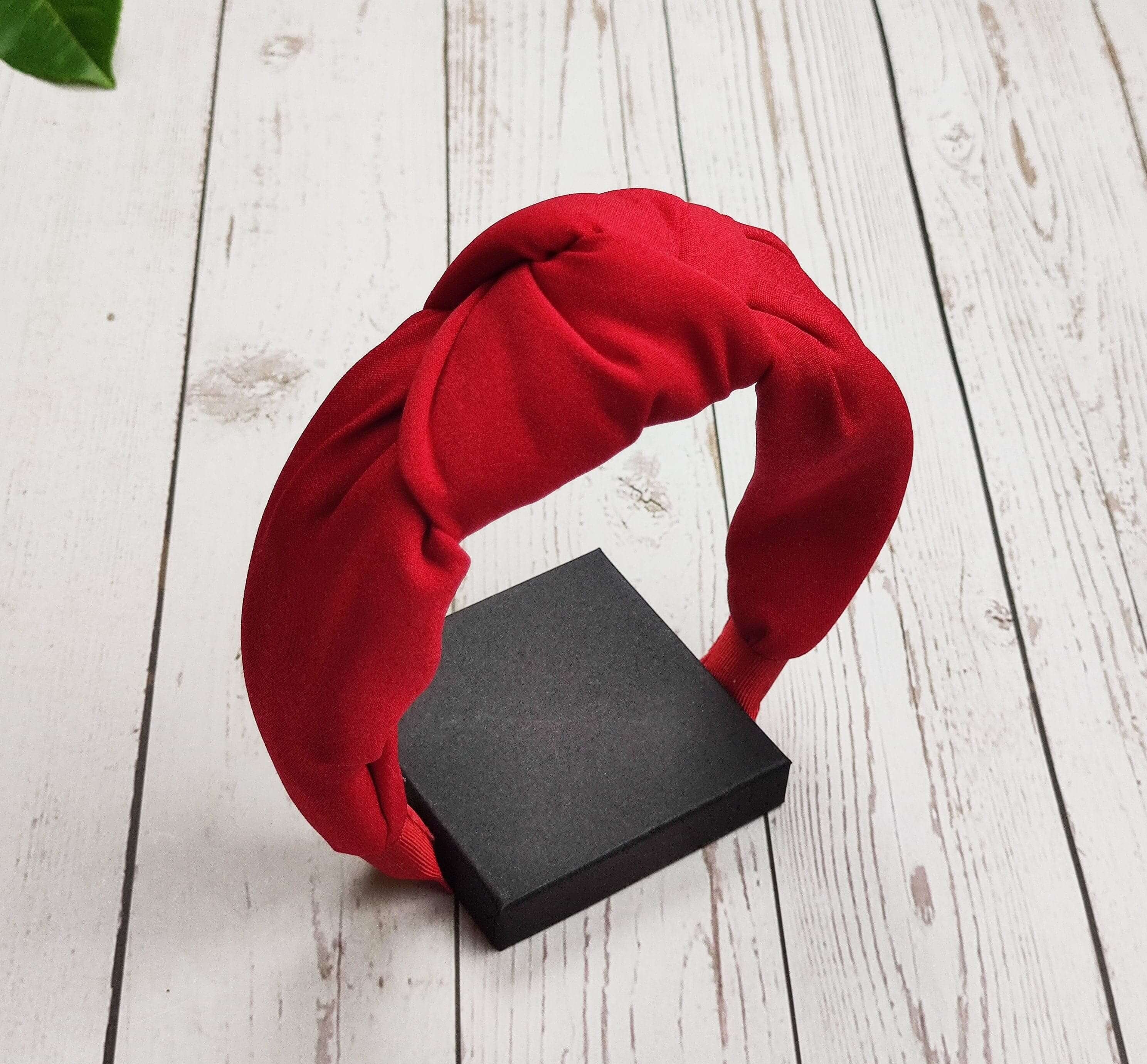 Check out our collection of fashionable hair accessories today, including our popular tie headband! This versatile accessory can be worn as a hair band, headband, or even scarf-style!