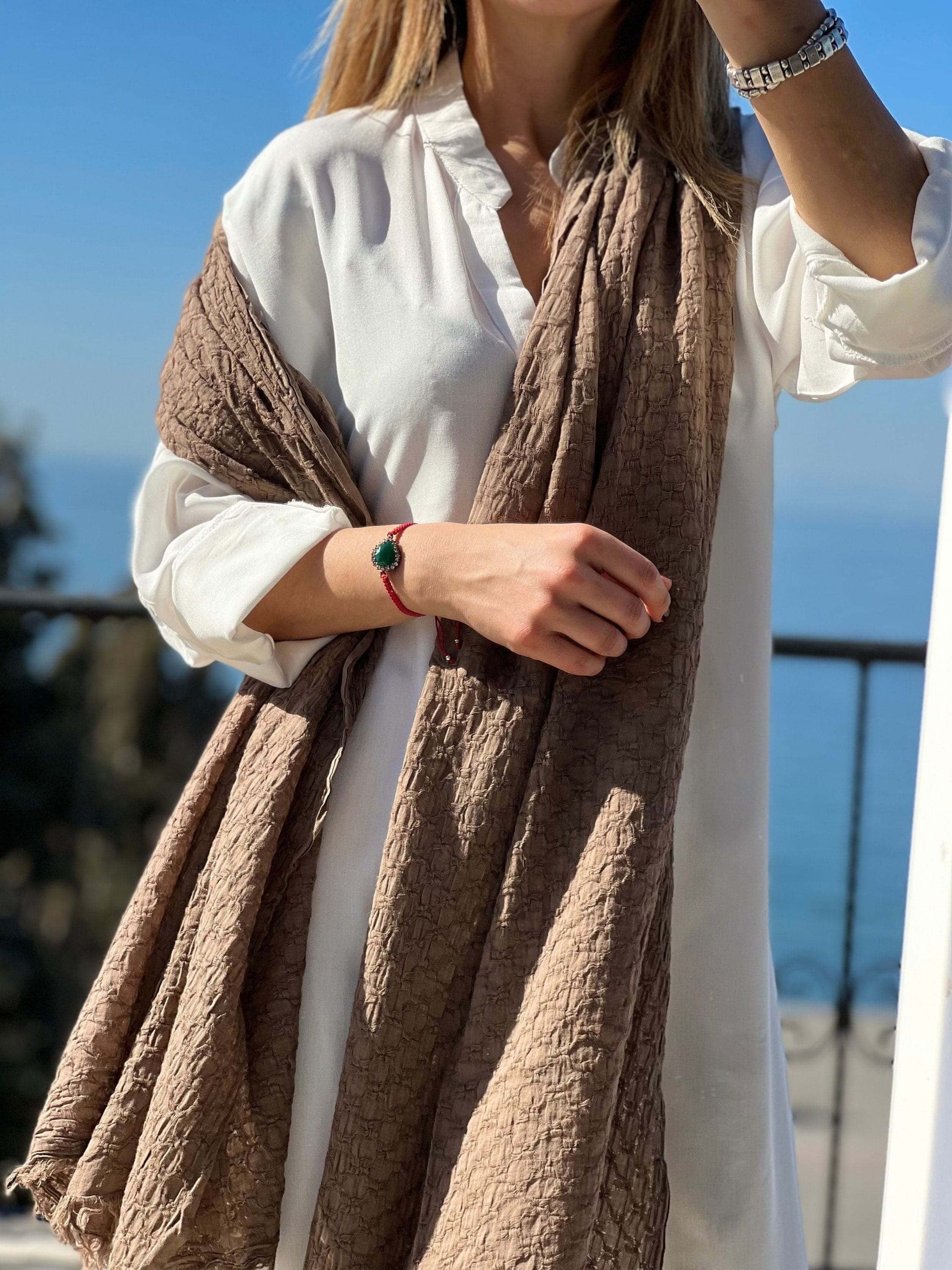 Choosing a scarf as an accessory in your outfit can be a good idea; it adds beauty and elegance to your fashion game, be it for religious purposes, fashion purposes, or sun protection, a scarf always serves its purpose.