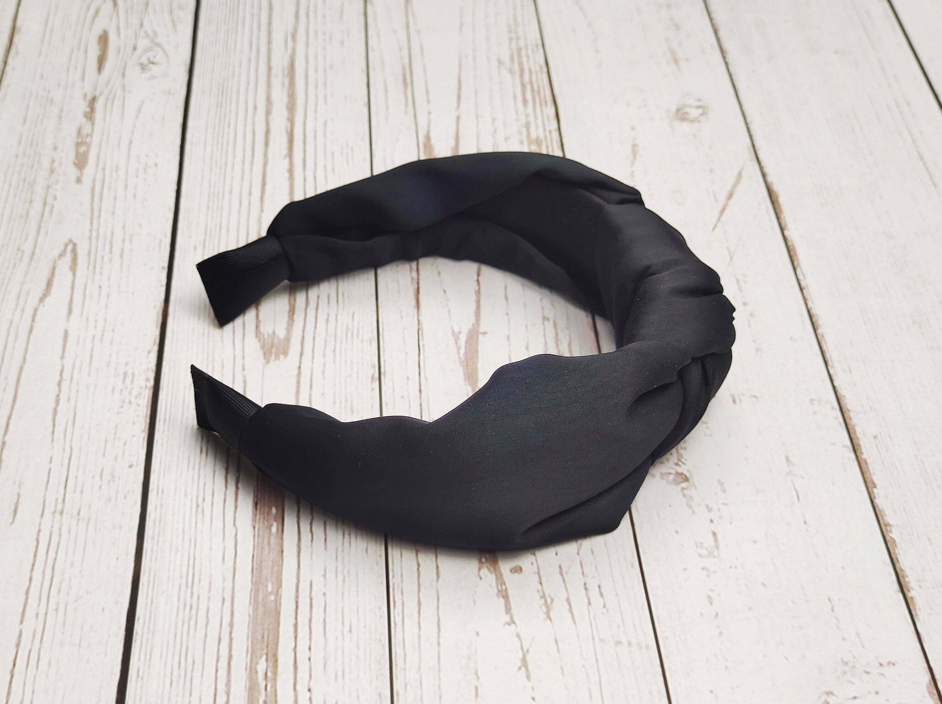 Get your stylish and comfortable Black Twist Knot Headband from now onwards! This headband is made from soft and durable viscose crepe, making it perfect for all your fashion needs.