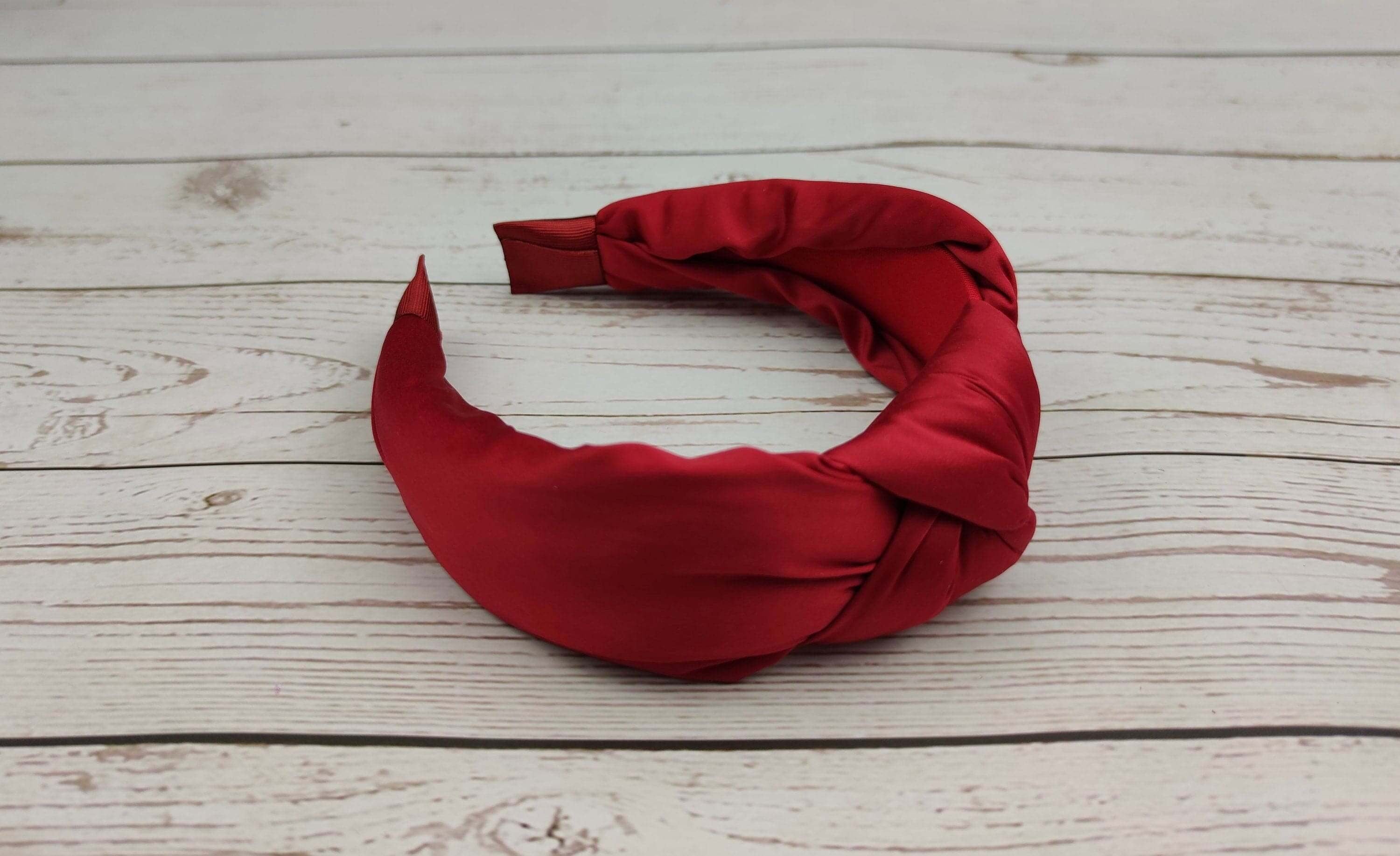 Upgrade her hair game with this must-have red satin headband, the perfect special occasions Day gift.