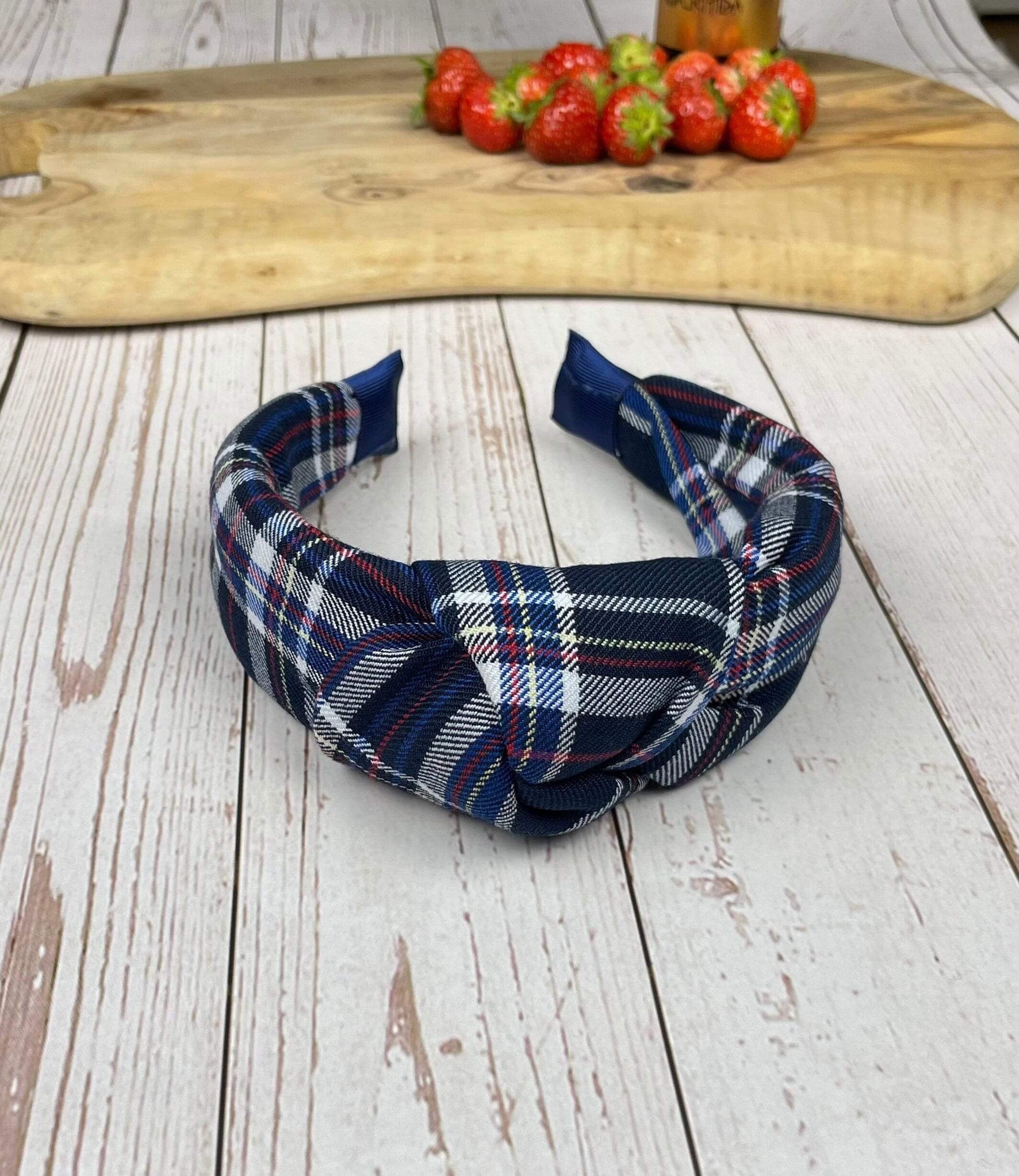 Stay trendy and comfortable with our Navy Blue and Pattern Wide Hairband. This headband is made from soft and stretchy material, perfect for all-day wear