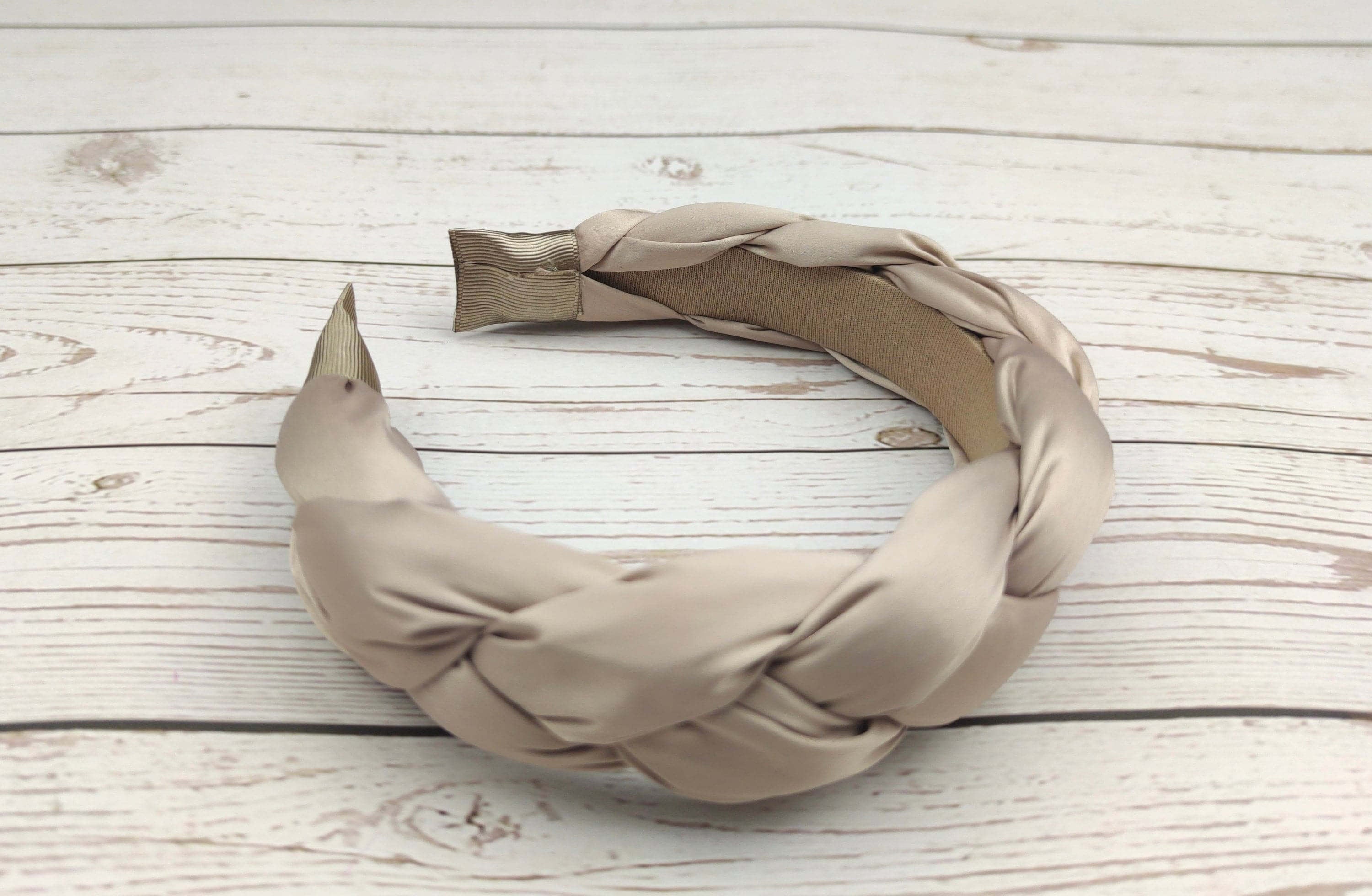 Make her feel beautiful with this on-trend cream color satin headband, perfect for summer.