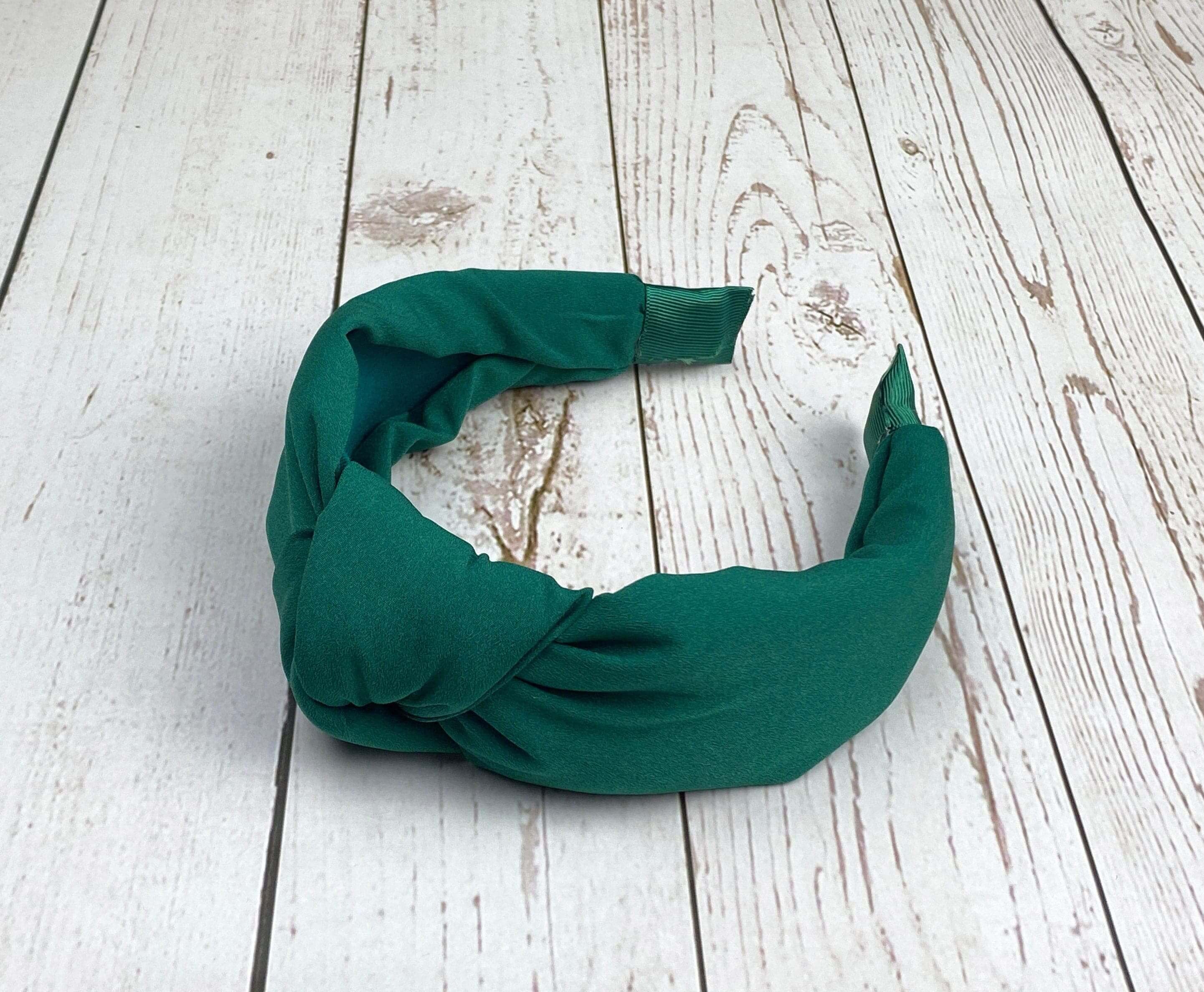 Stay stylish all day long with our range of emerald green tie bands for women. Our tie headbands are made from soft and luxurious green satin fabric that will make you look fabulous!