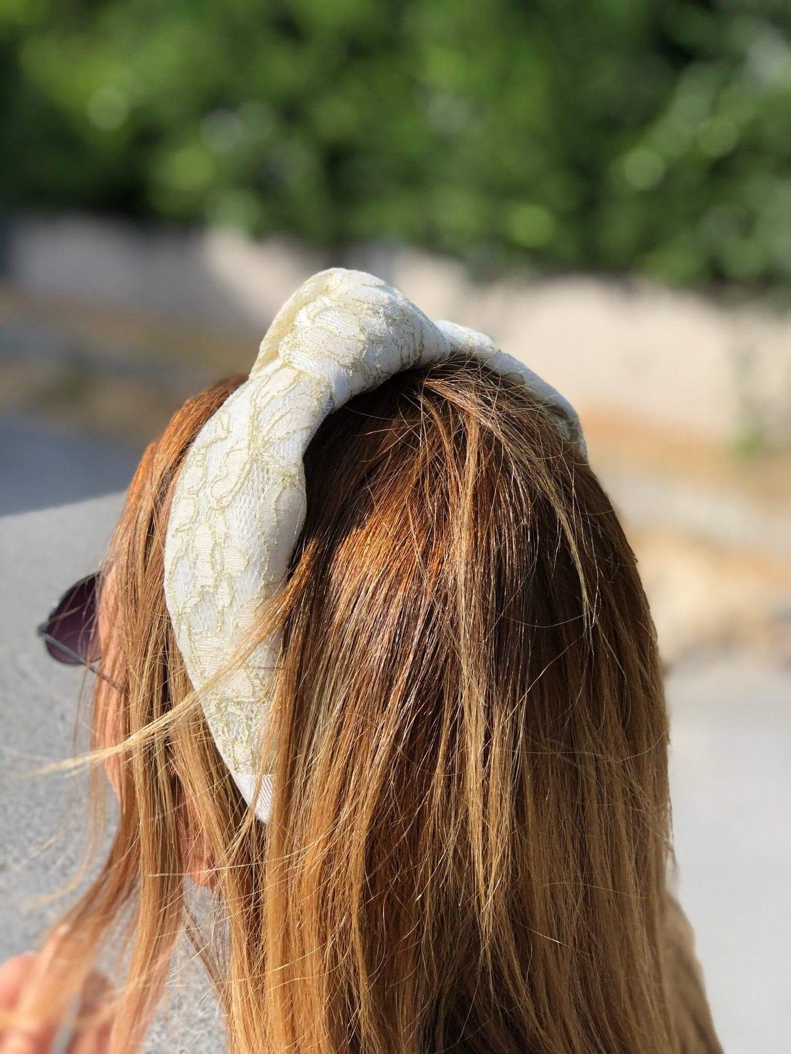 Complete your bridal look with this stunning Wedding Headband in white