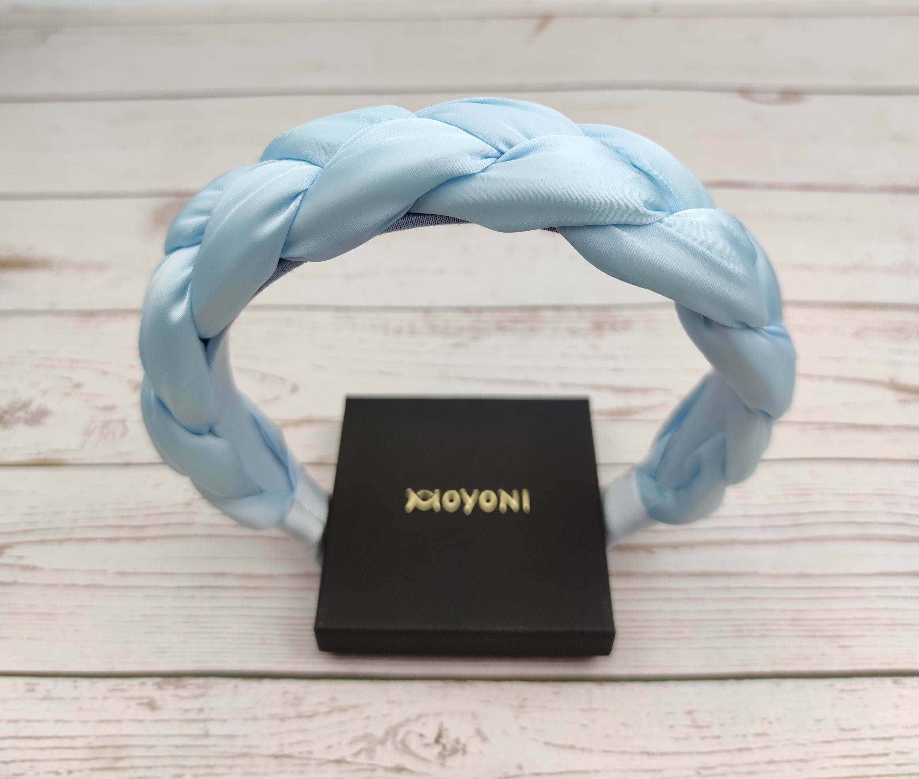 A must-have classic headband in a chic light blue hue.
