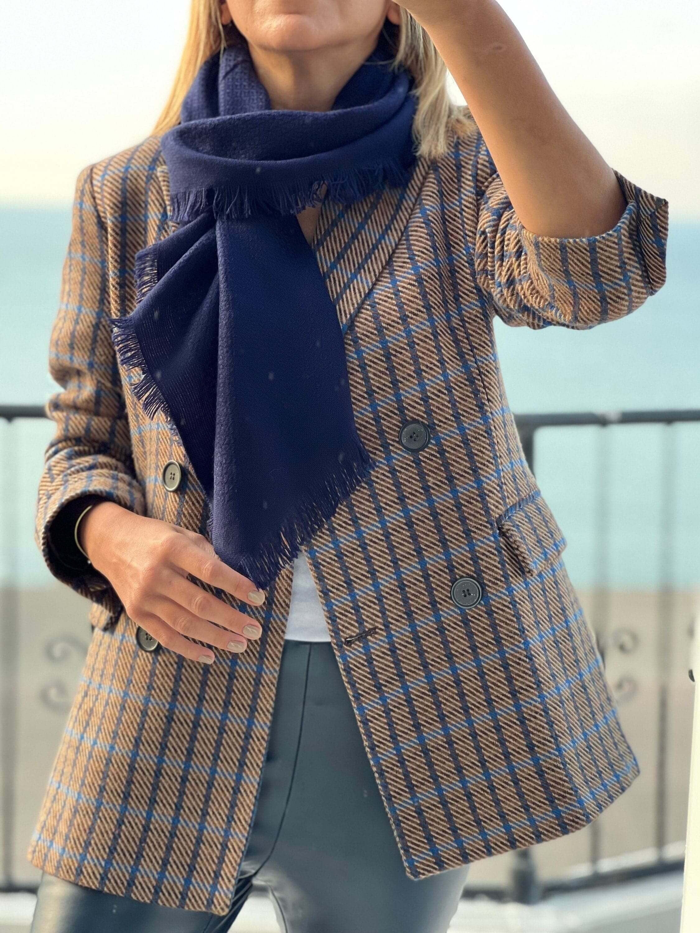 Add a pop of color to your winter wardrobe with this navy blue cotton wool blend scarf. A great gift for her, this solid scarf is soft and warm.