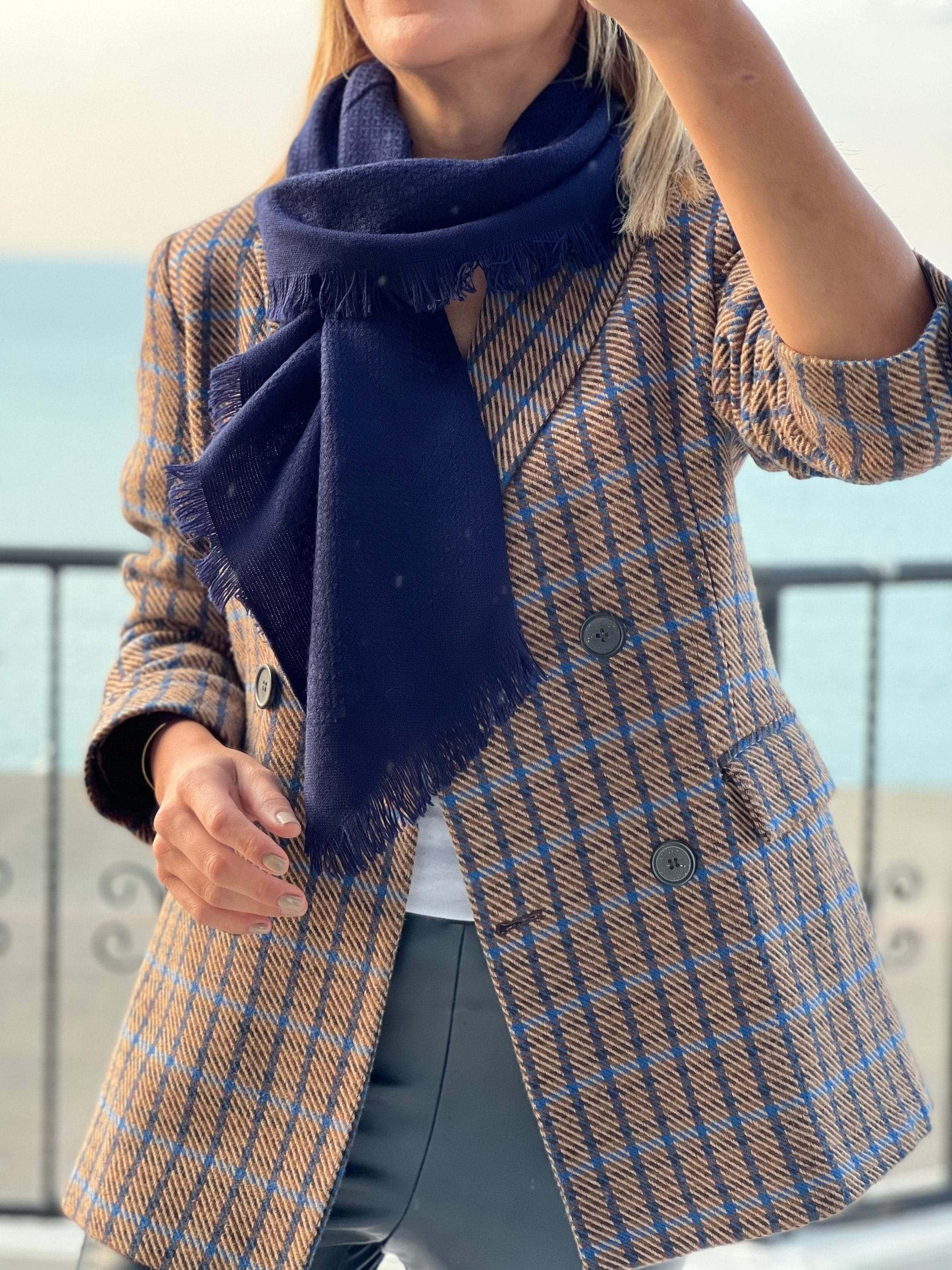 Stay warm and cozy this winter with this navy blue cotton wool blend scarf. A perfect gift for her, this solid scarf is soft and comfortable.