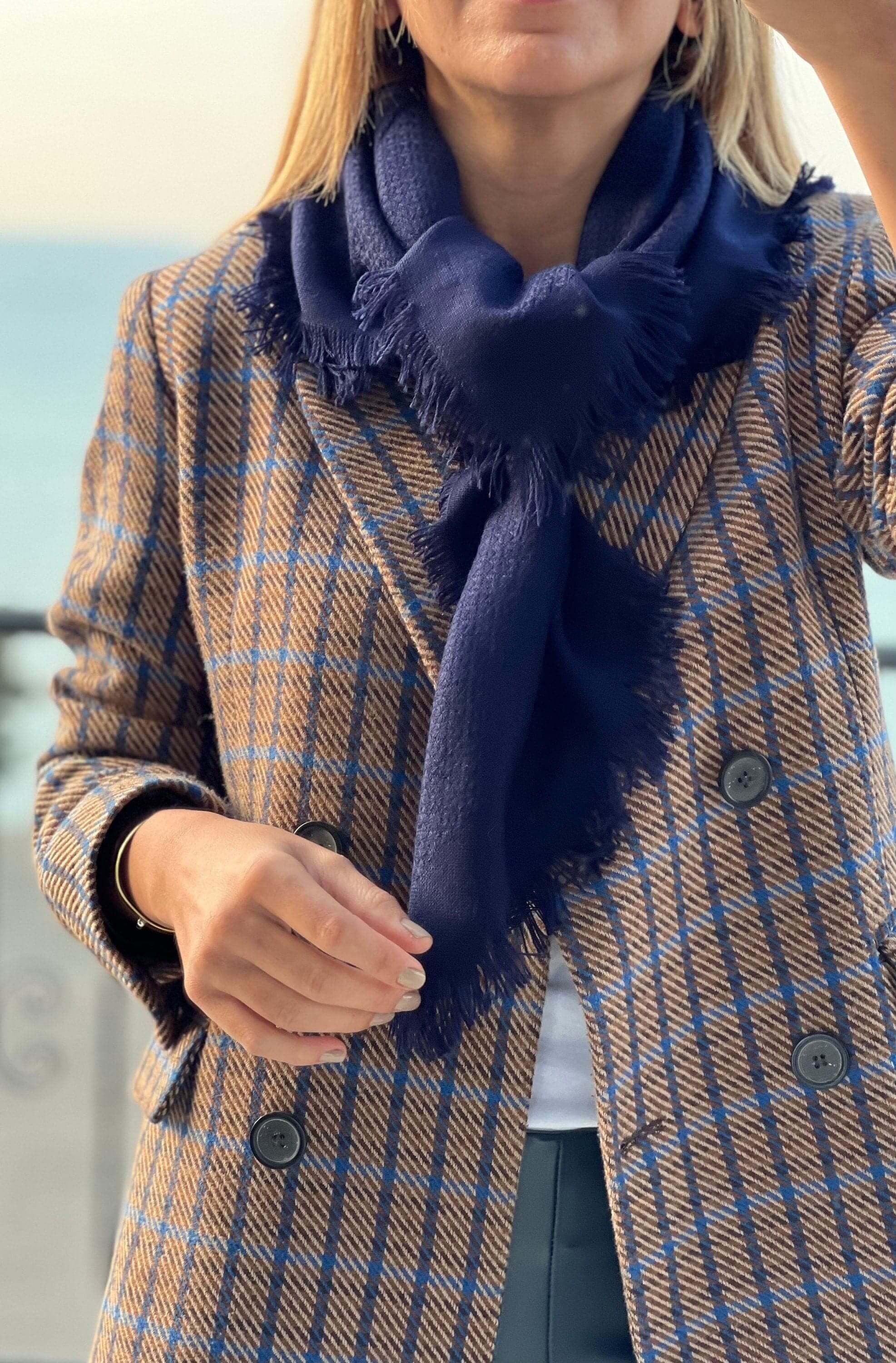 Stay warm and stylish this winter with this navy blue cotton wool blend scarf. A perfect gift for her, this solid scarf is soft and comfortable.