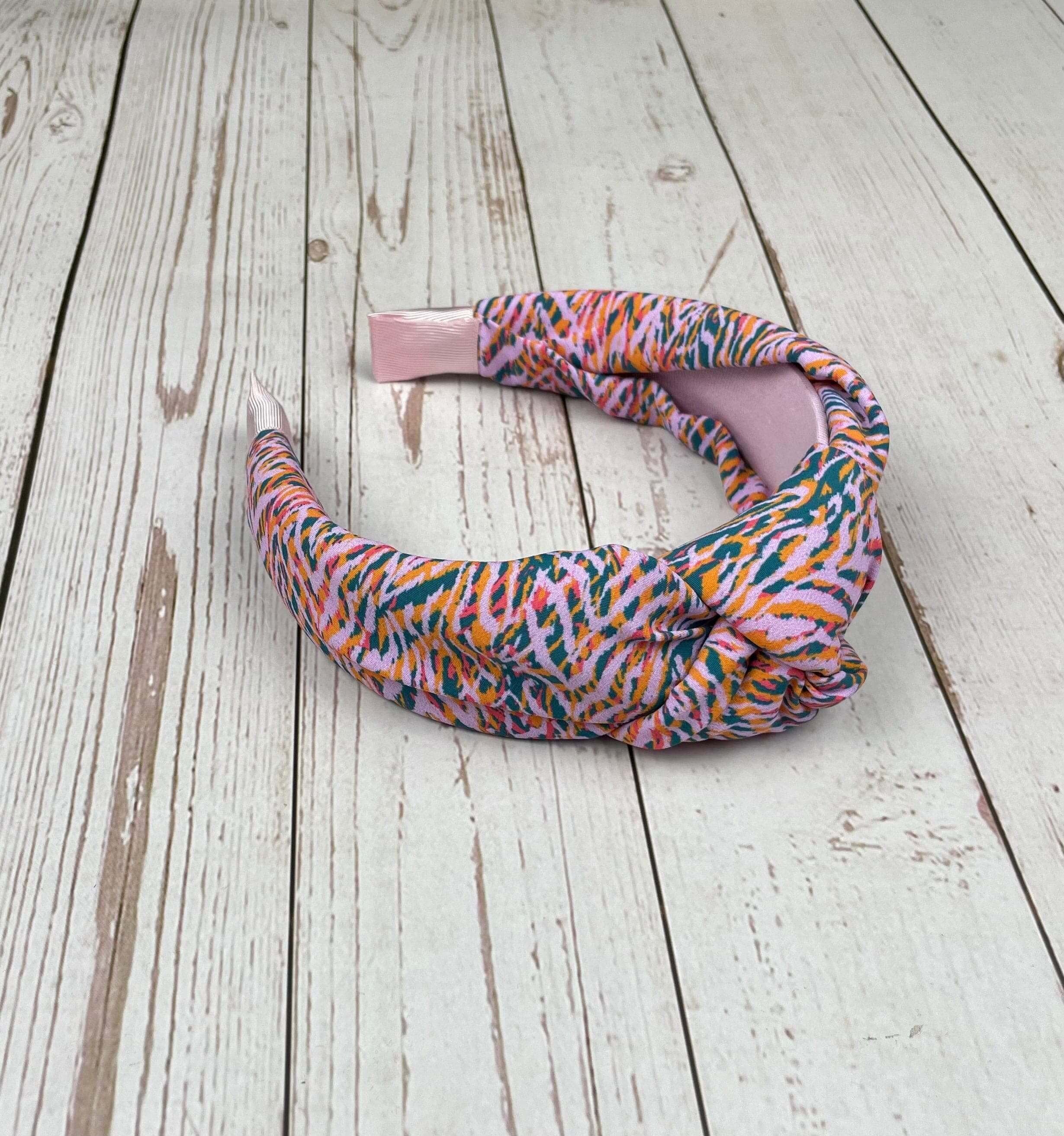 Make the perfect gift for a fashionable girl with this Multicolor KNOTTED HEADBAND