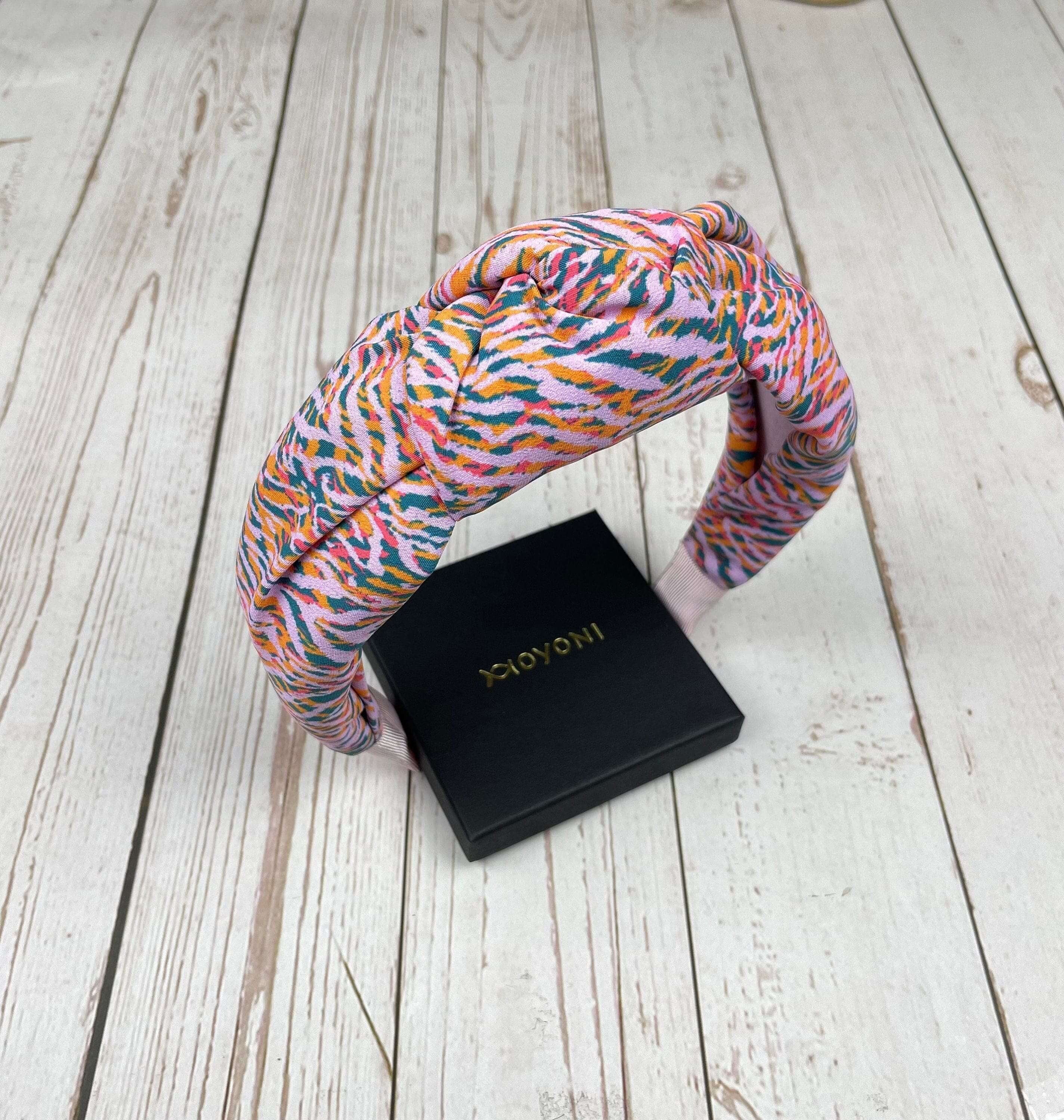 Add a touch of personality to your hair with this Women Colorful Headband