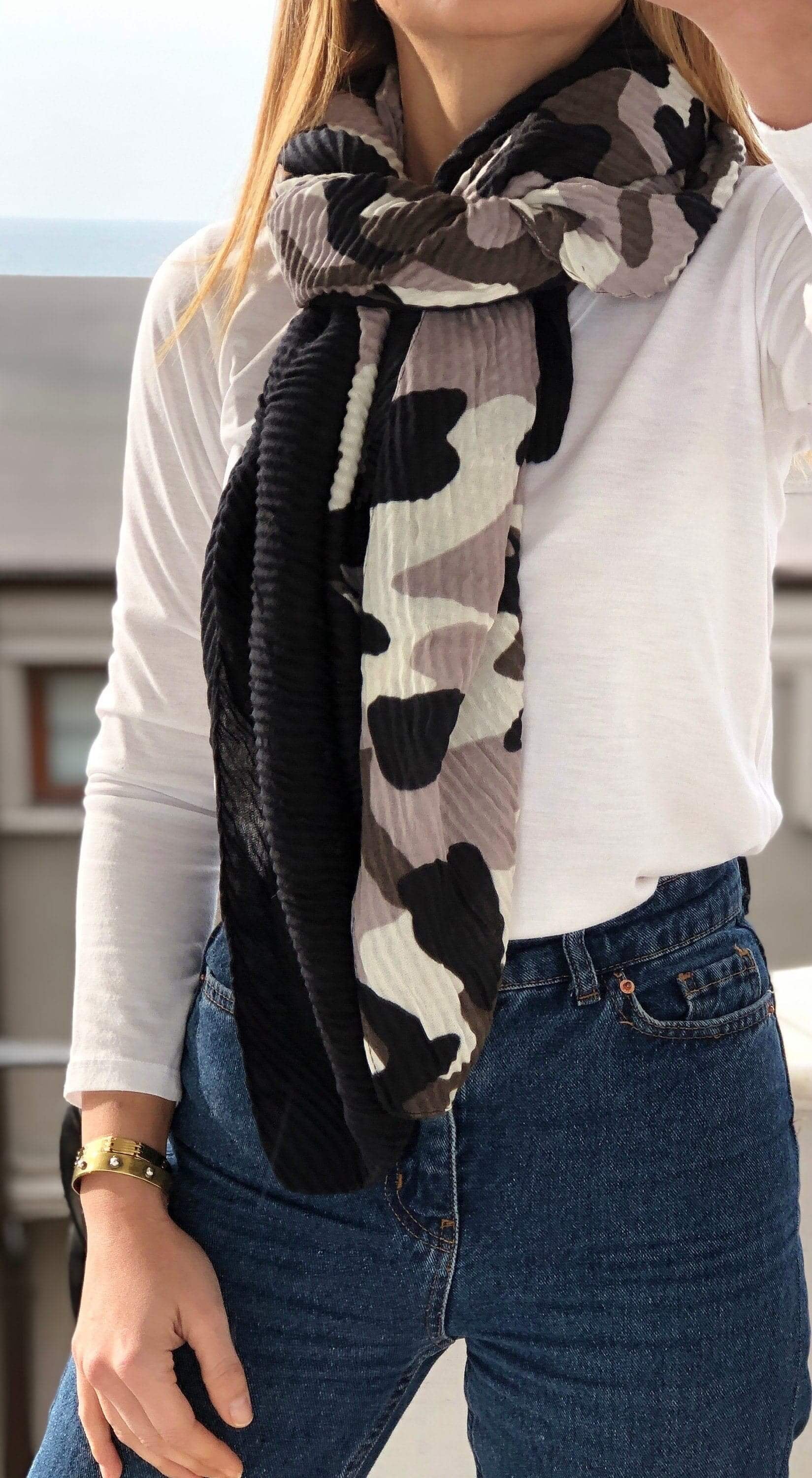 Rectangle scarf in a stylish grey, black, and white camouflage pattern.