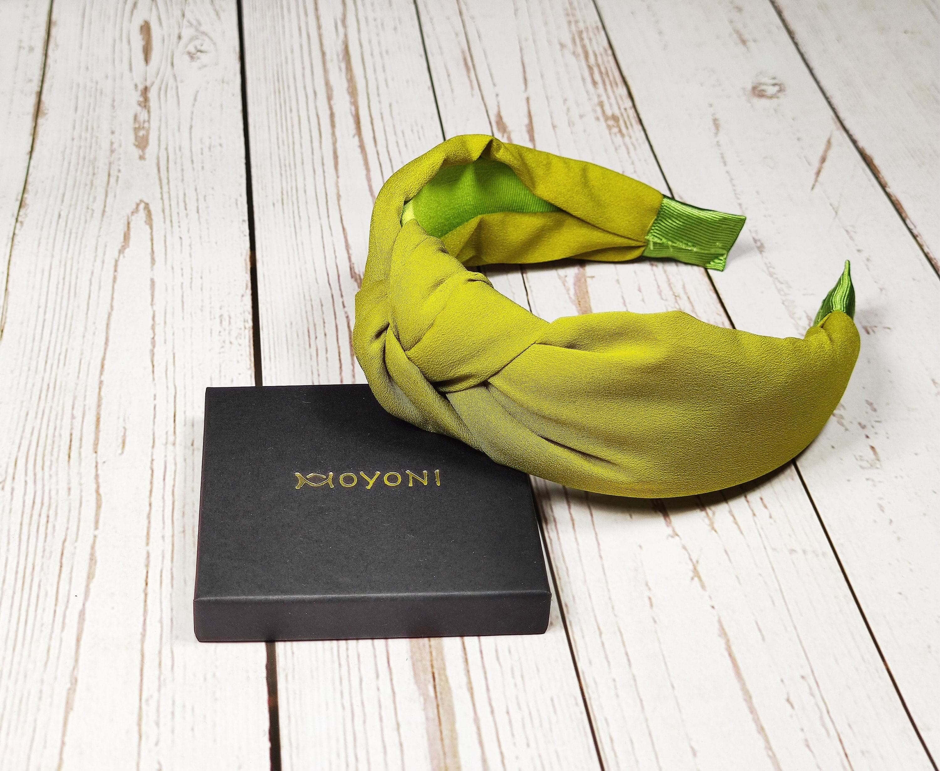 A stylish, lightweight, and versatile headband perfect for summer. Check out this lime green twist headband that is perfect for a summer day!