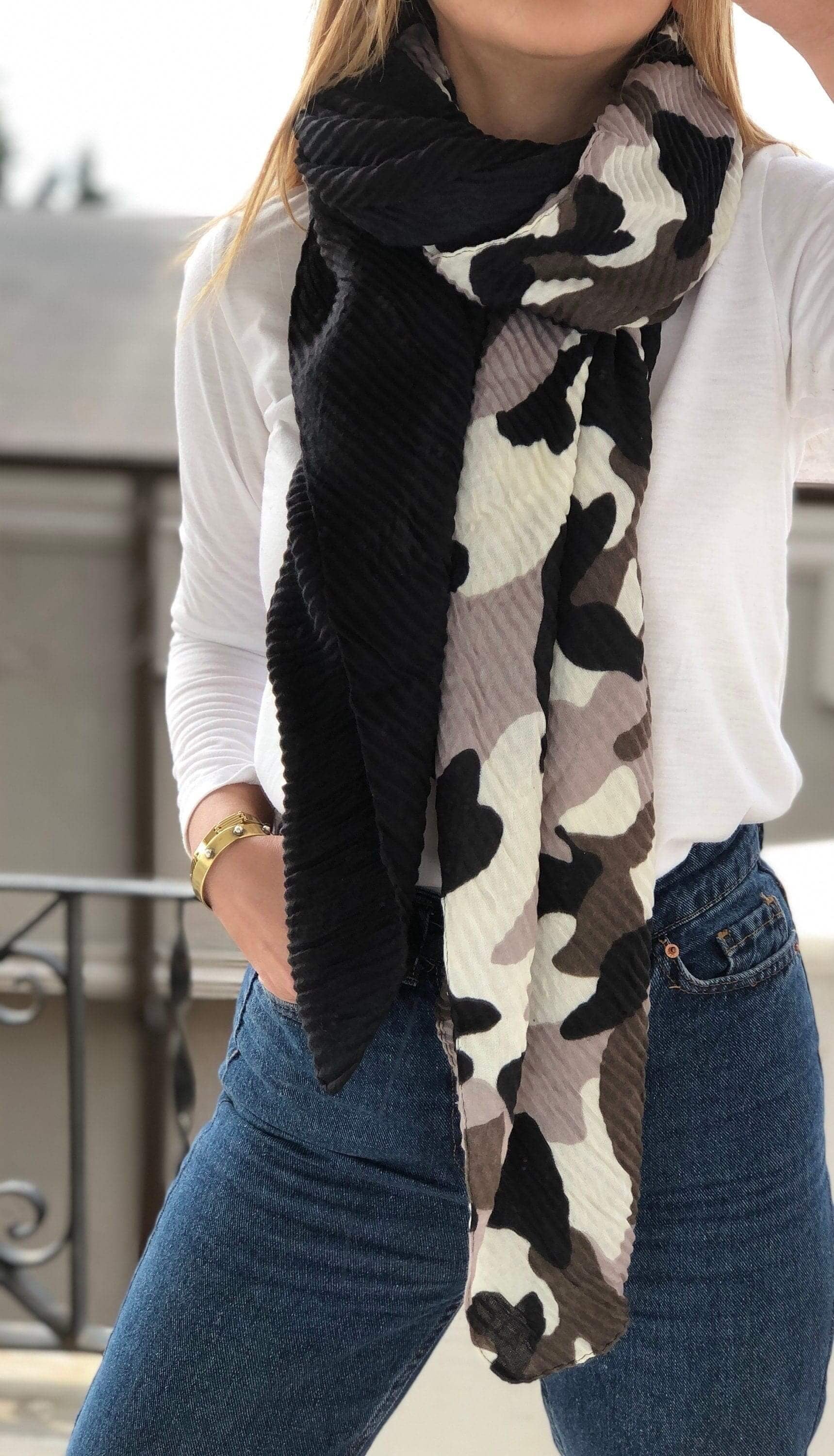 The perfect accessory to complete any outfit with this stylish grey, black and white camouflage scarf.