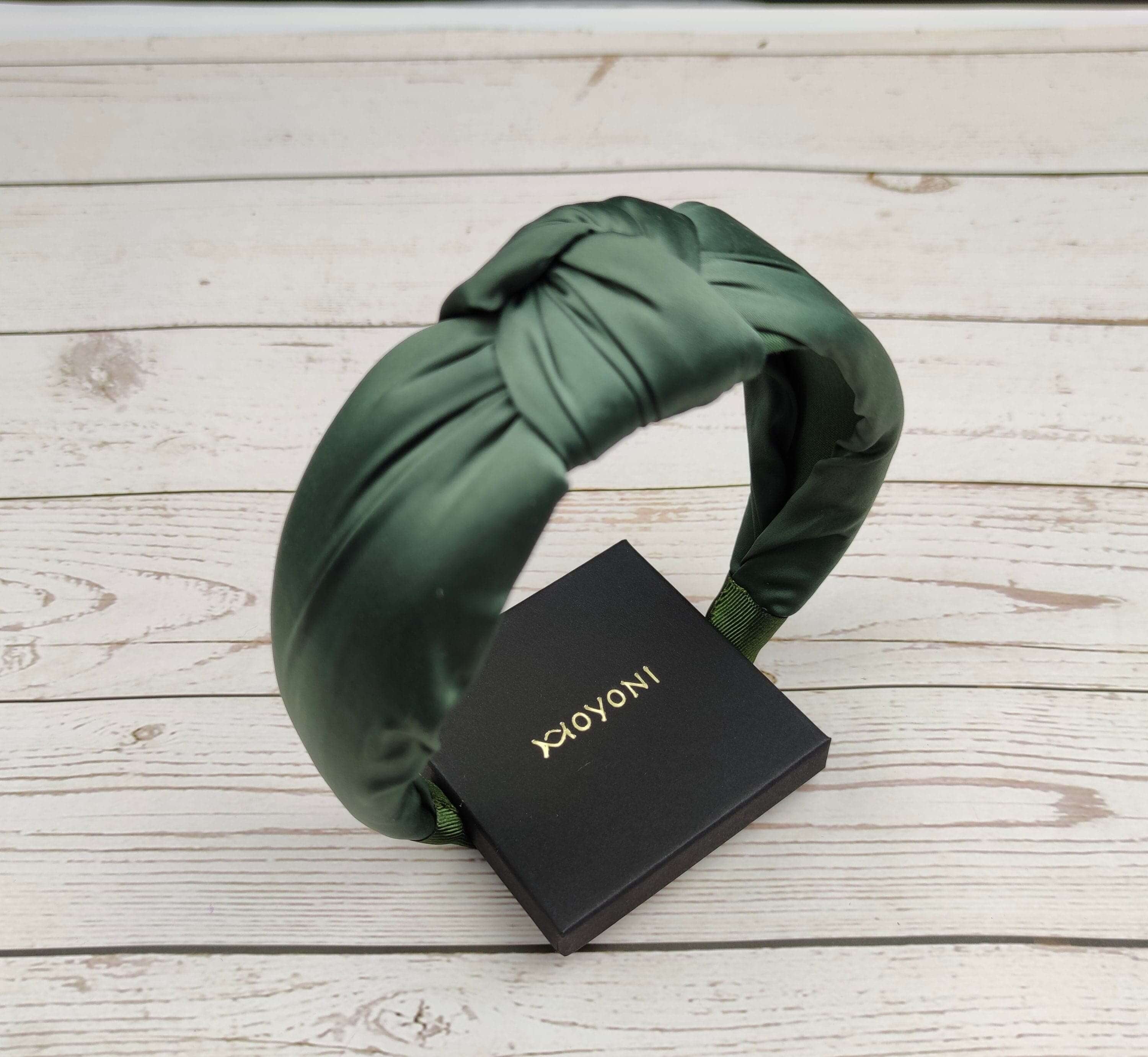 Add a touch of elegance to your outfit with this stylish Green color padded satin headband. This headband is made of soft and comfortable satin fabric and features a delicate embroidery design.