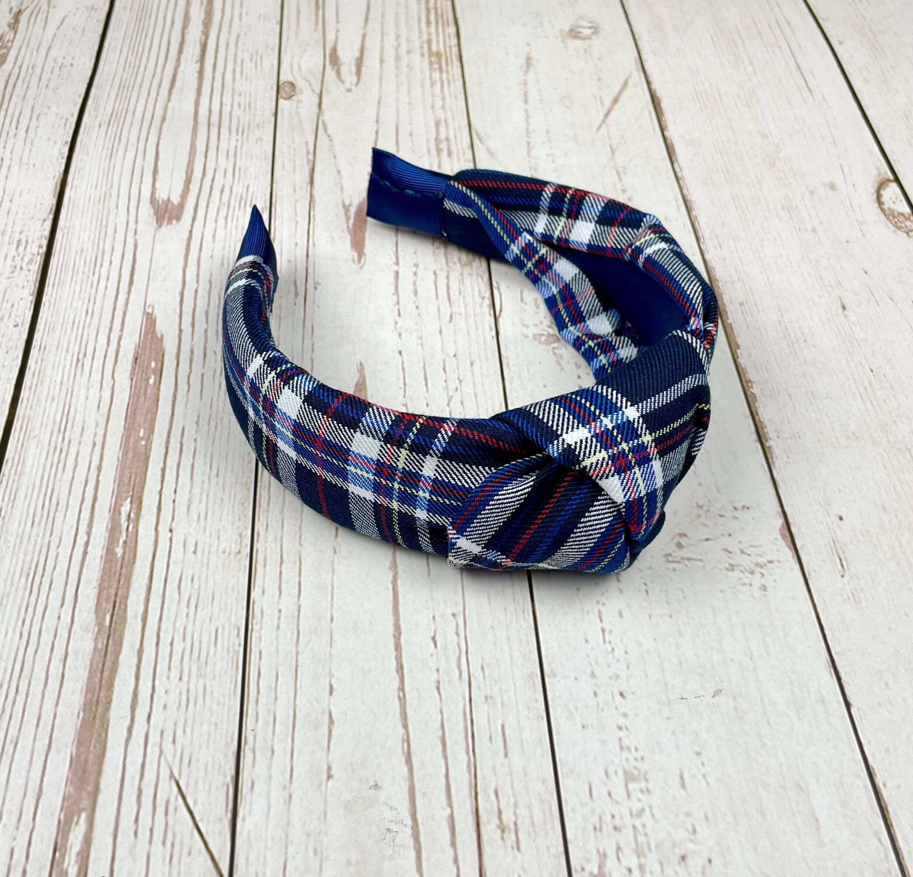 Upgrade your hair accessory collection with our Navy Blue and Pattern Headband. This wide hairband is perfect for teenage girls and is made from soft and stretchy material