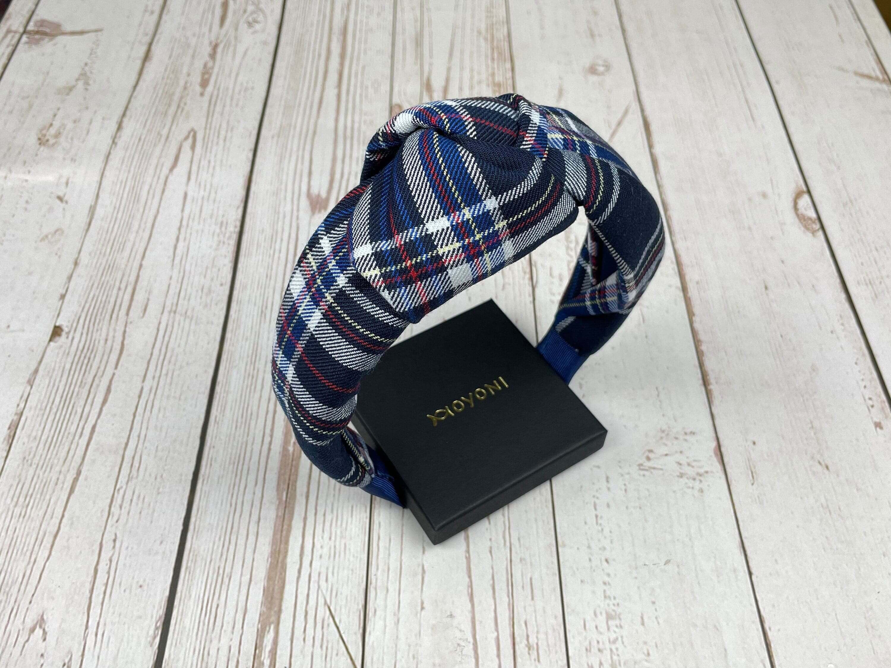 Get ready to make a statement with our stylish Navy Blue and Pattern Alice Band. This headband is perfect for teenage girls and is designed for a comfortable and secure fit.