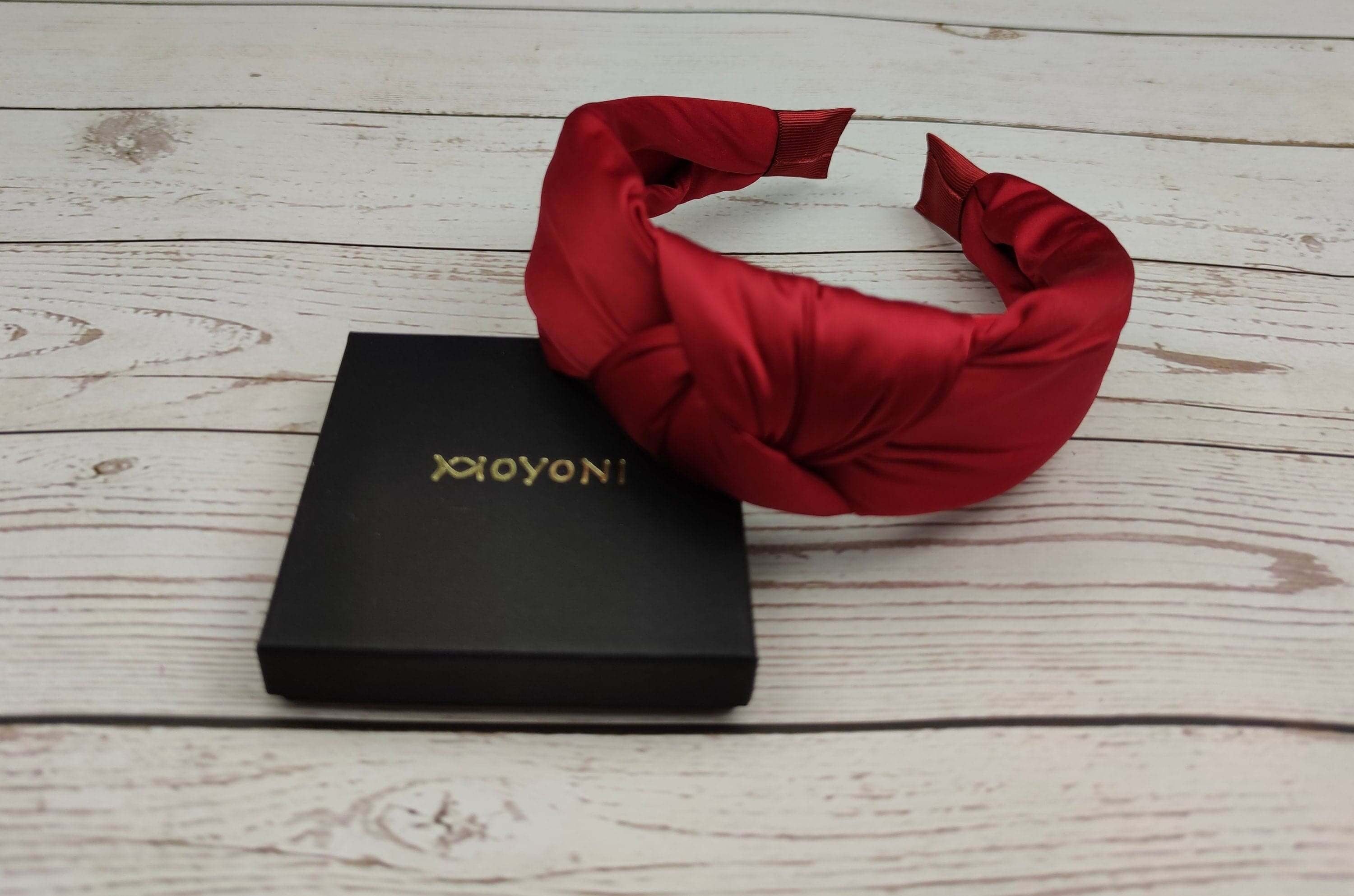 Treat her to a luxurious head accessory this birthday with this beautifully designed red satin headband.