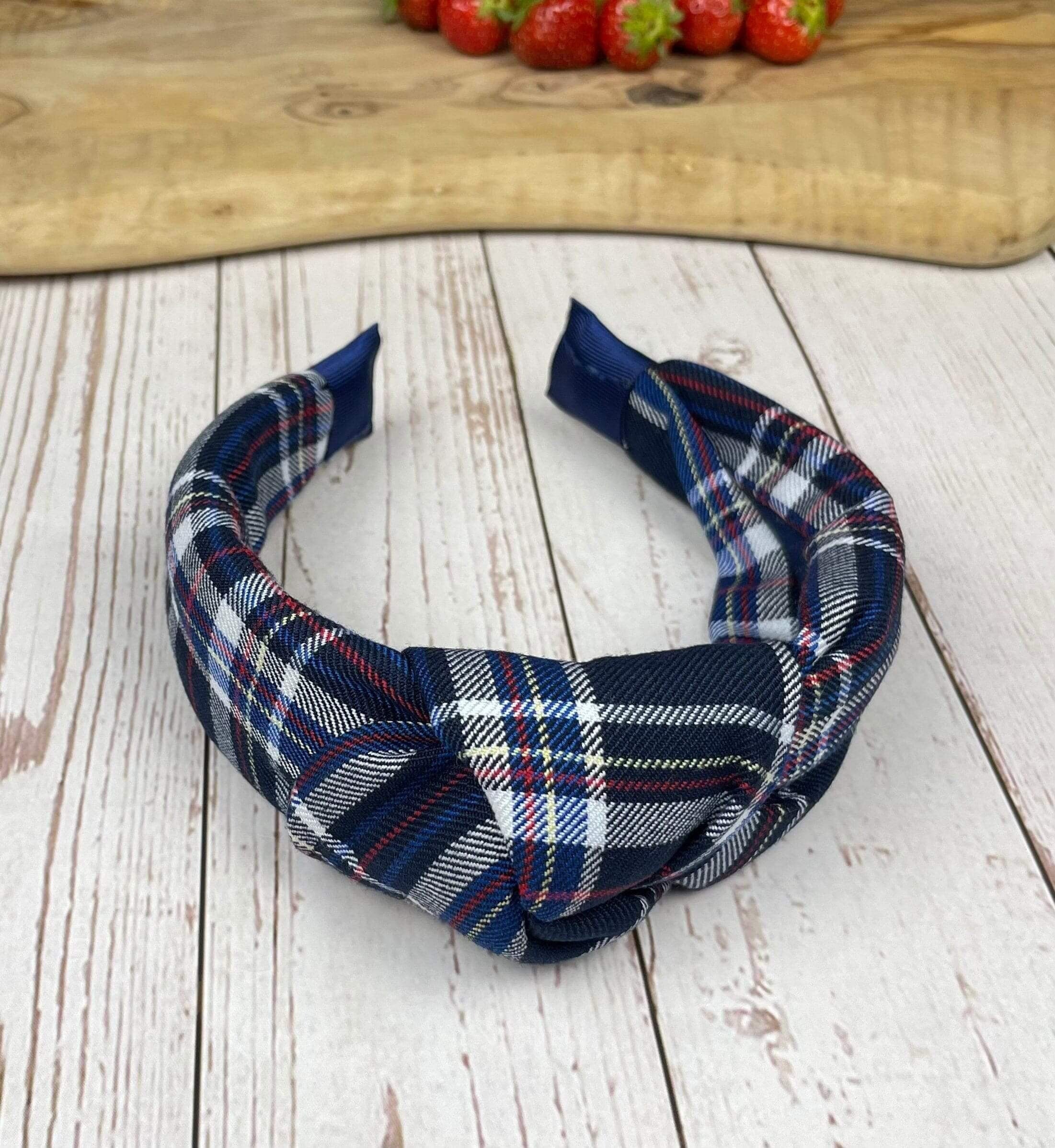 Add a touch of pattern to your hair game with our Navy Blue and Pattern Headband. This fashion wide hairband is perfect for teenage girls looking for a stylish accessory.