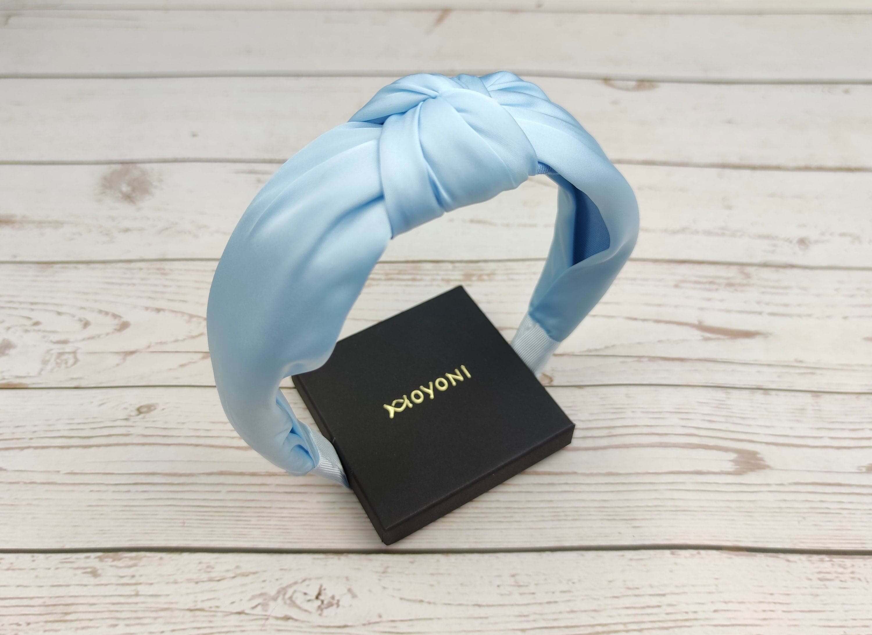 Find the perfect headband for your outfit with our selection of stylish and colorful headbands. Made from soft and comfortable fabric, these blue headbands will keep your hair in place all day long.
