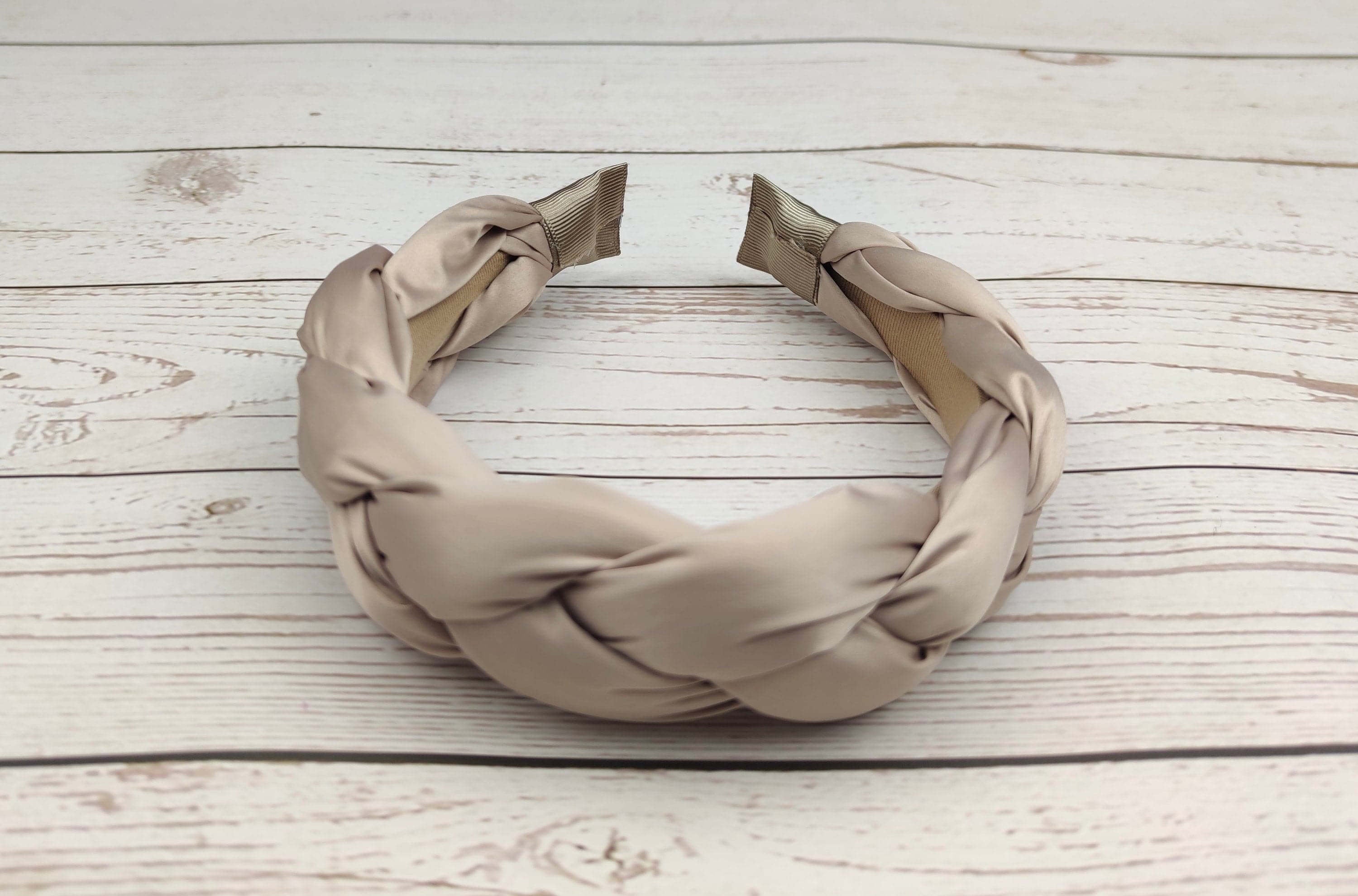 Give the gift of effortless summer style with this must-have beige satin headband for women.