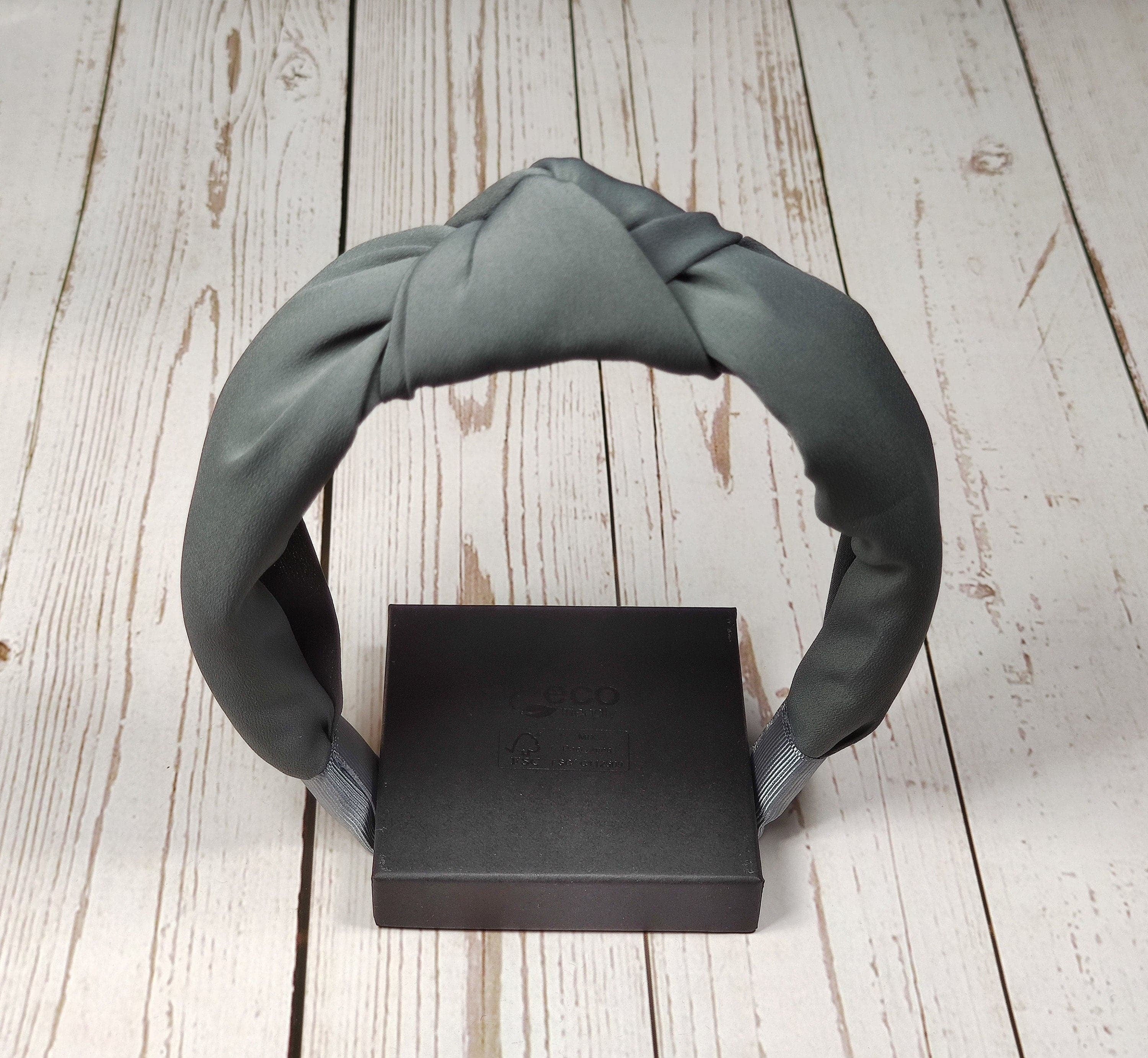 Get your stylish and comfortable Gray Twist Knot Headband from now onwards! This headband is made from soft and durable viscose crepe, making it perfect for all your fashion needs.