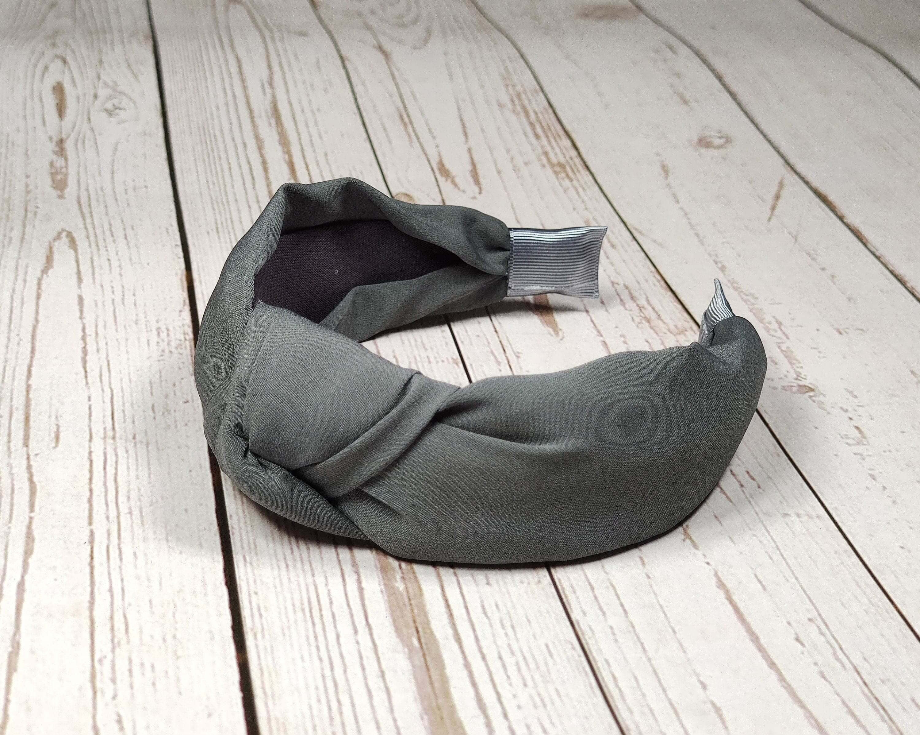 If you&#39;re looking for a fashionable hairband that you can wear both day and evening, then check out these grey twist knot headbands! They come in many different colors and are made from soft and comfy viscose crepe material.