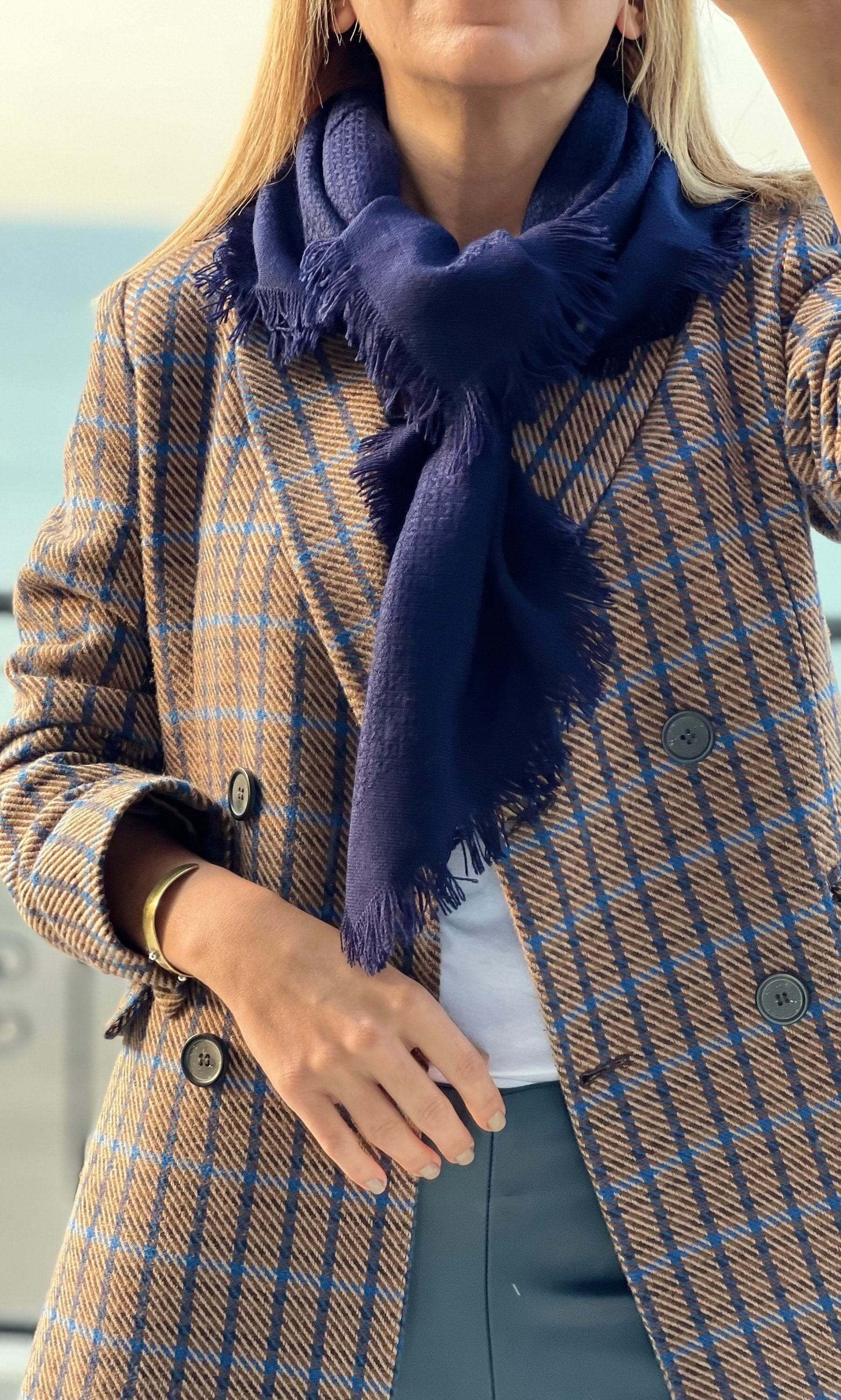 Stay stylish and cozy this winter with this navy blue cotton wool blend scarf. A great gift for her, this solid scarf is soft and warm.