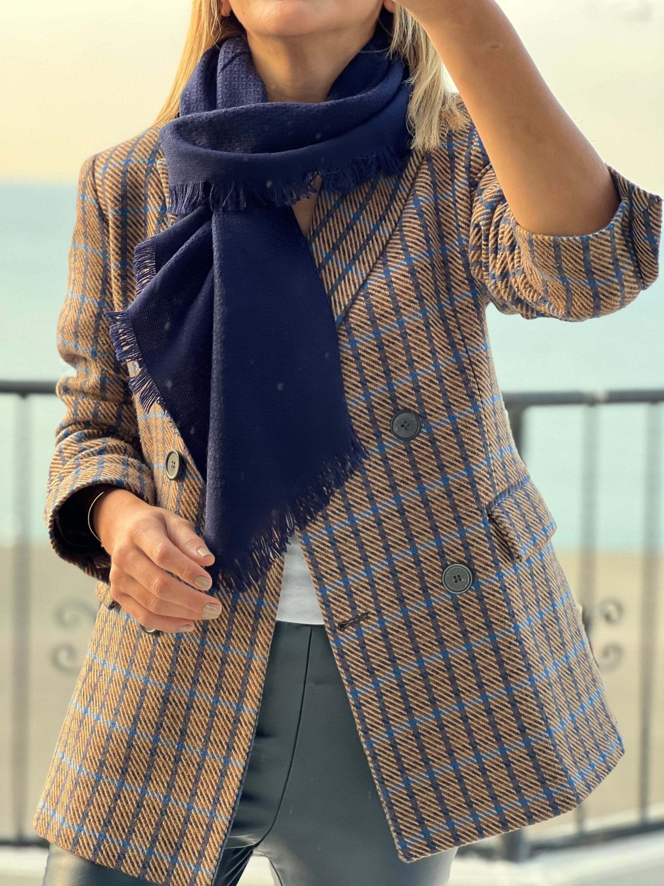 Add a pop of color to your winter wardrobe with this navy blue cotton wool blend scarf. A great gift for her, this solid scarf is soft and cozy.