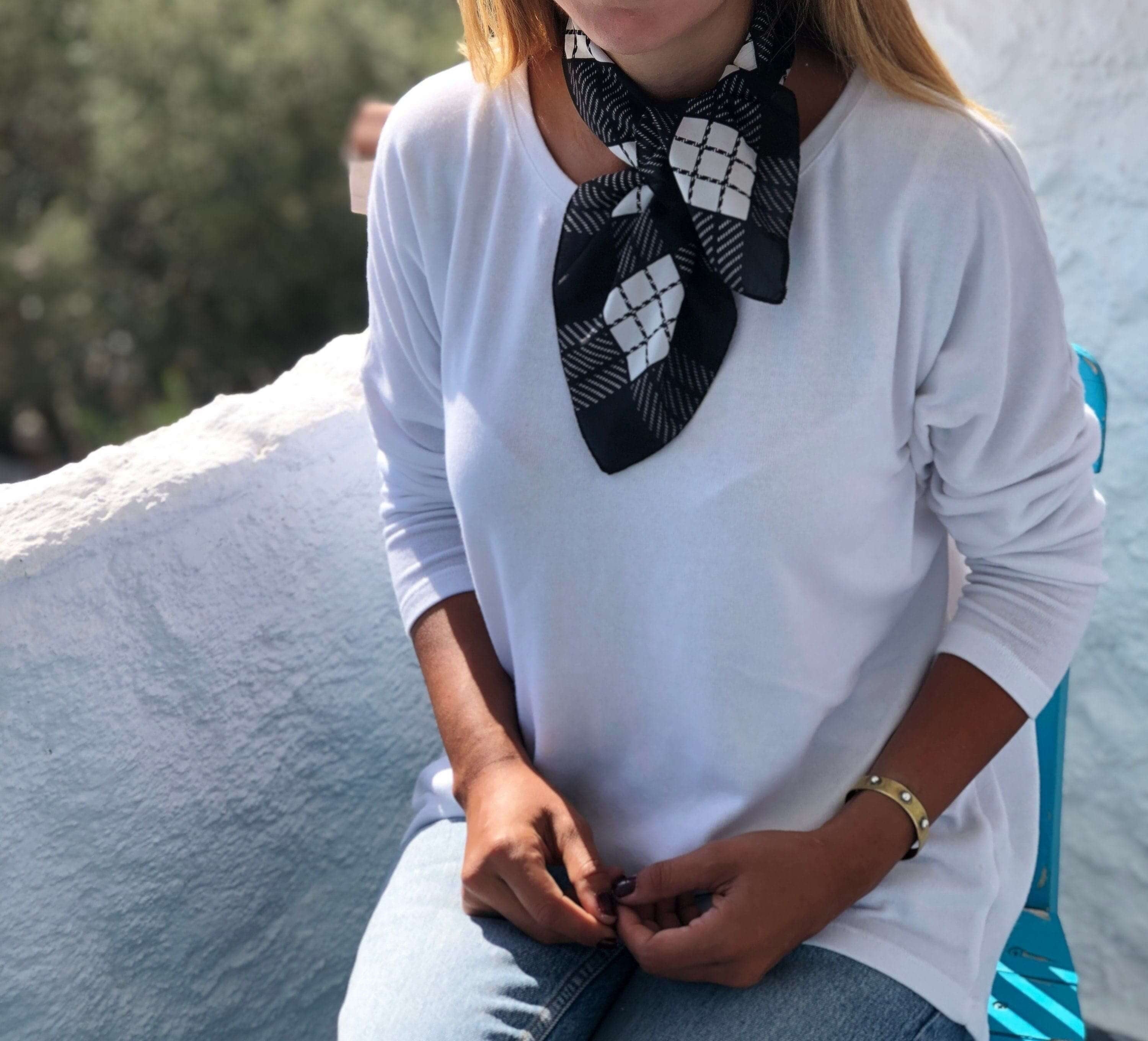Wrap yourself in elegance with our Black White Pattern Silk Blend Scarf. Made from the finest quality silk blend, this scarf is a perfect combination of comfort and style.
