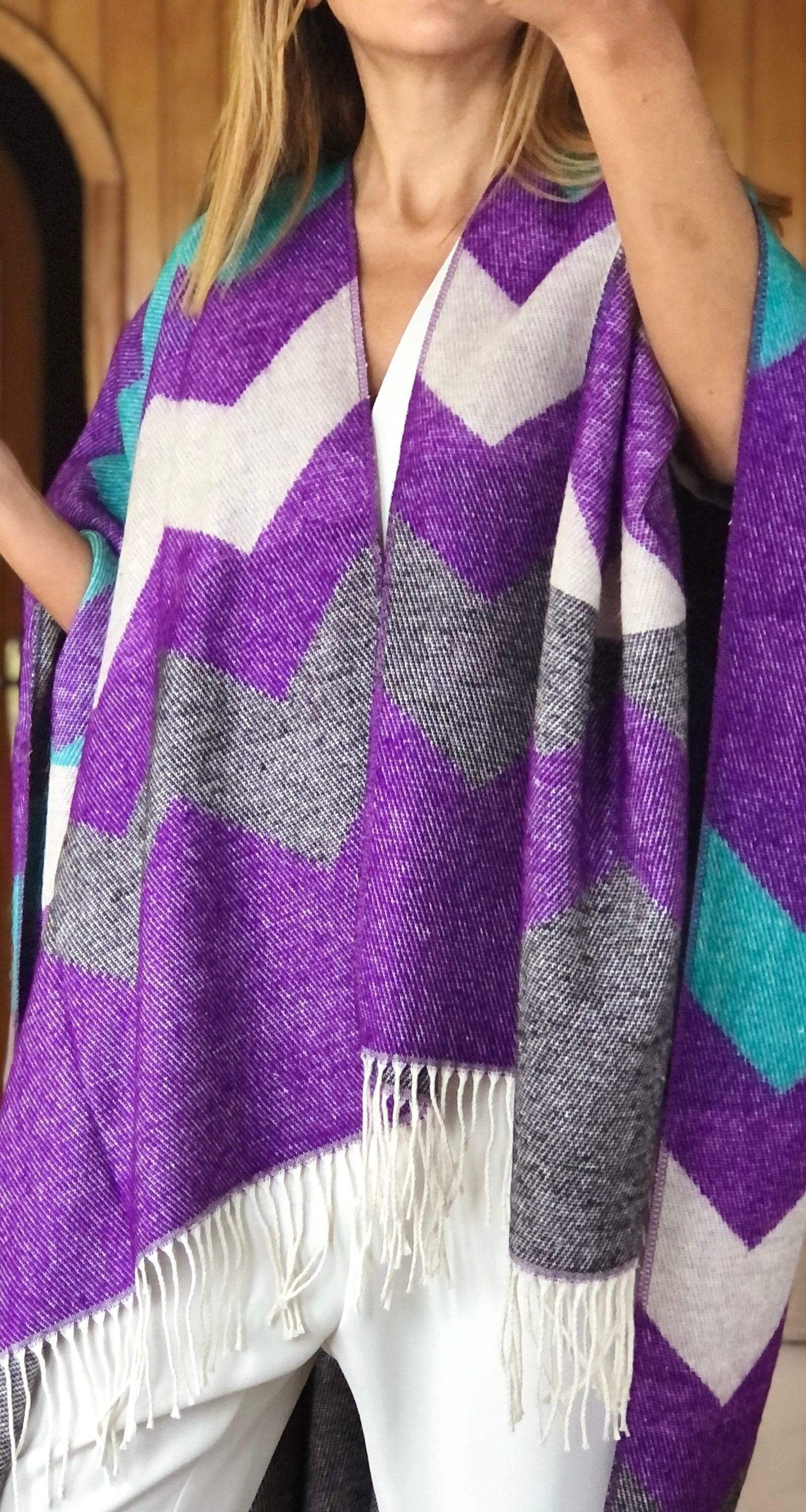 Purple and gray wool blend poncho with white and blue accents