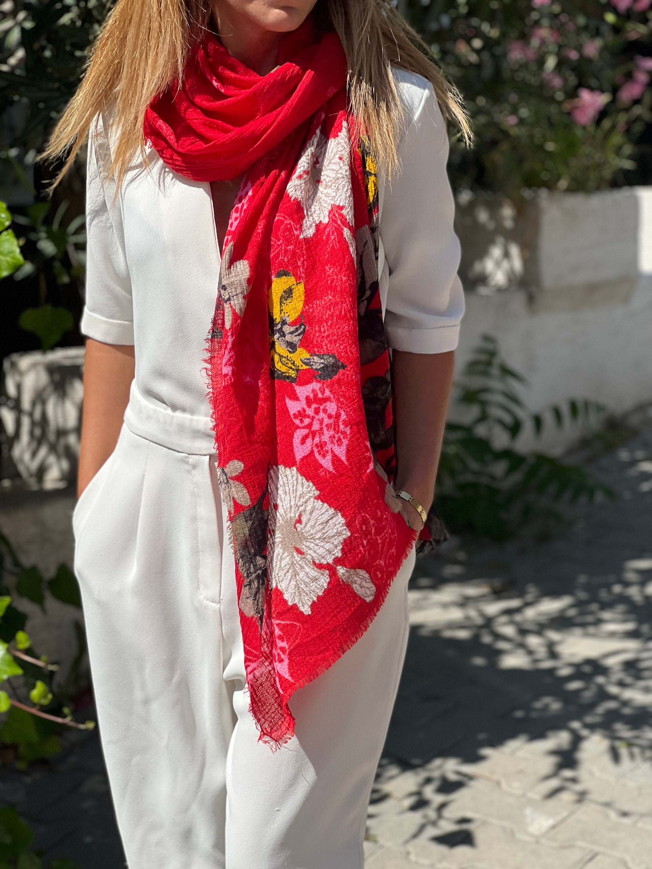 The lightweight cotton material of this scarf makes it perfect for all seasons.