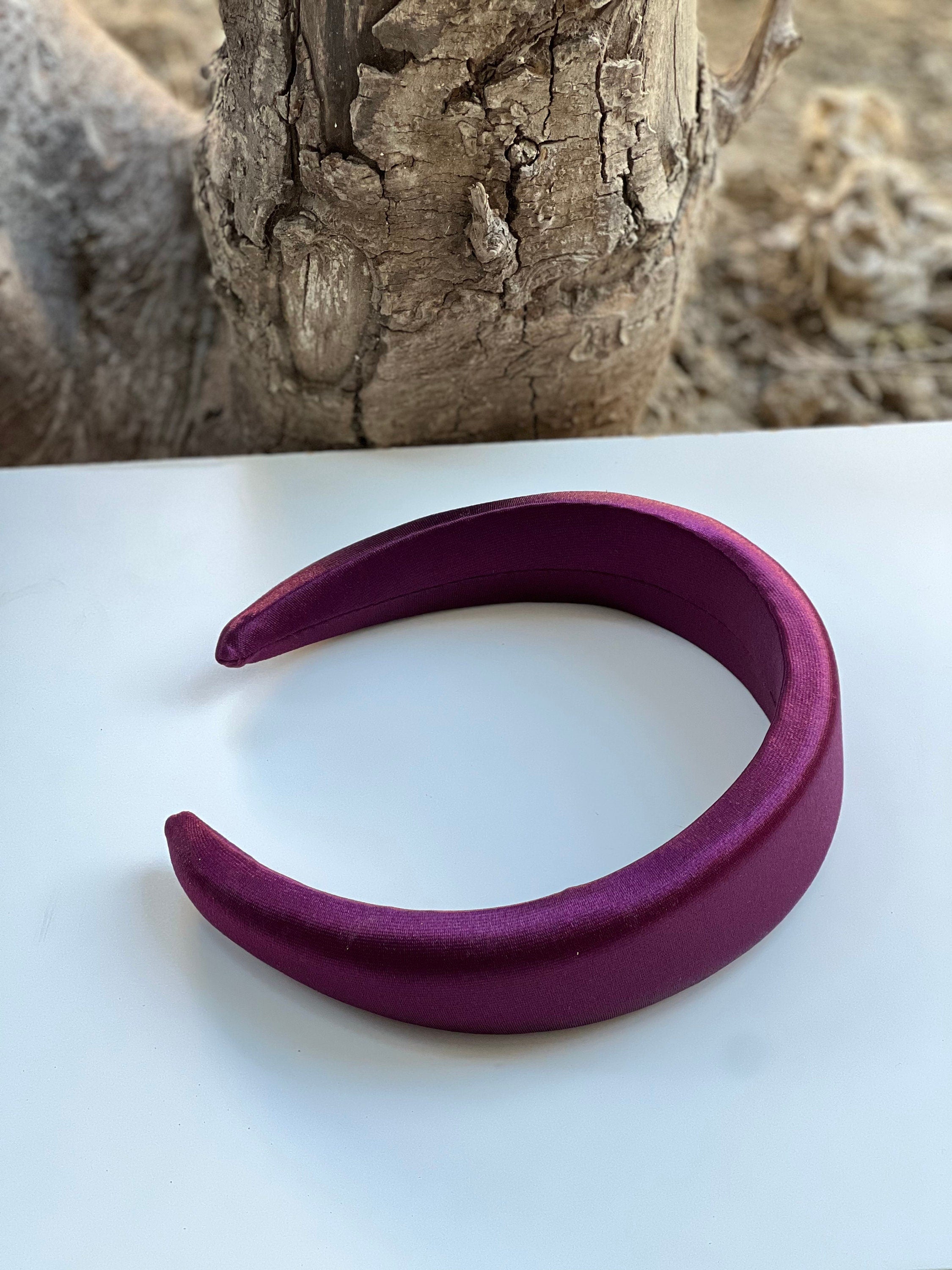 Dark cherry-colored headband with padded comfort for all-day wear.